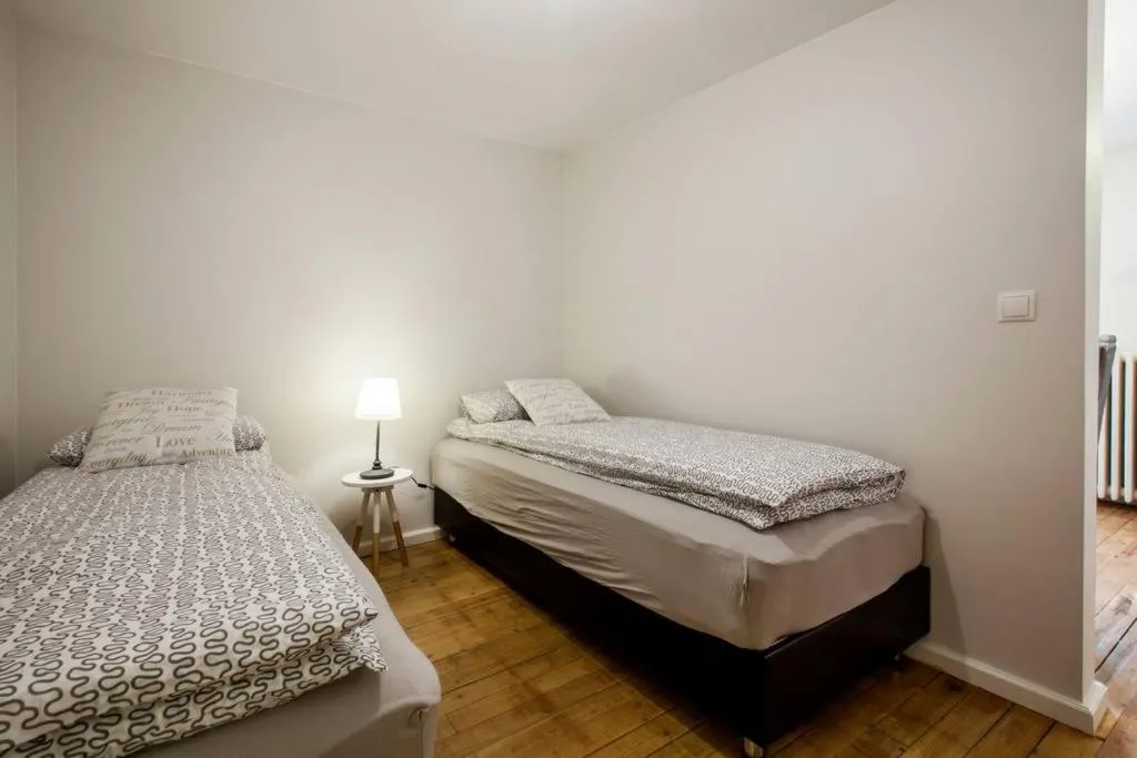Bed in Grey Apartments