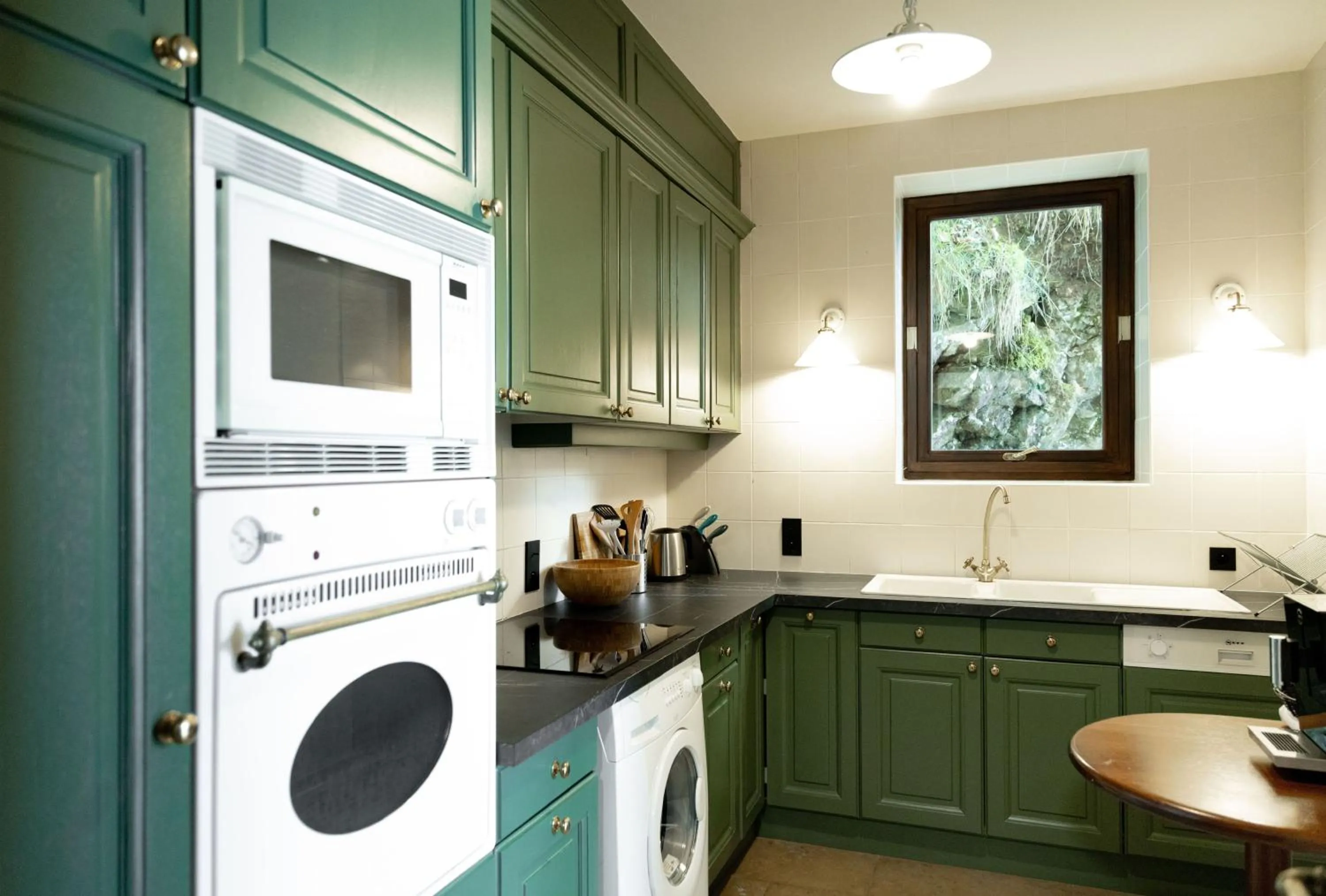 Kitchen or kitchenette in Le Palace De Menthon