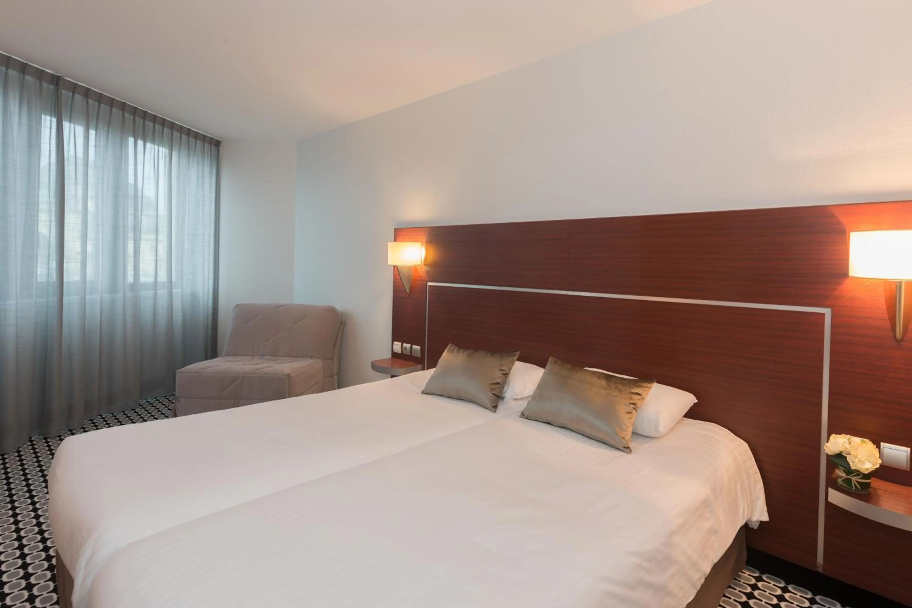 Photo of the whole room, Bed in Kyriad Limoges Centre Gare - Atrium