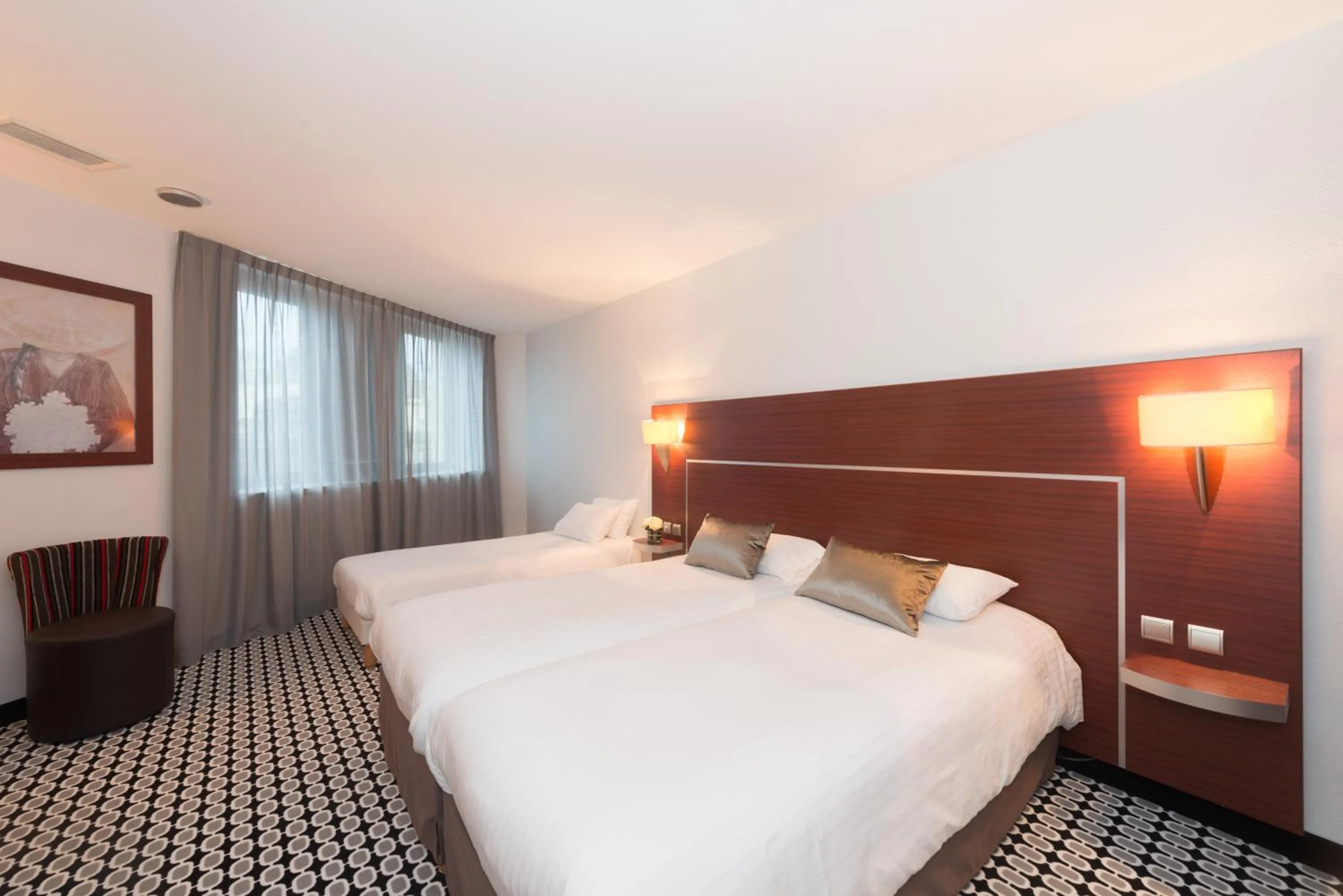 Photo of the whole room, Bed in Kyriad Limoges Centre Gare - Atrium