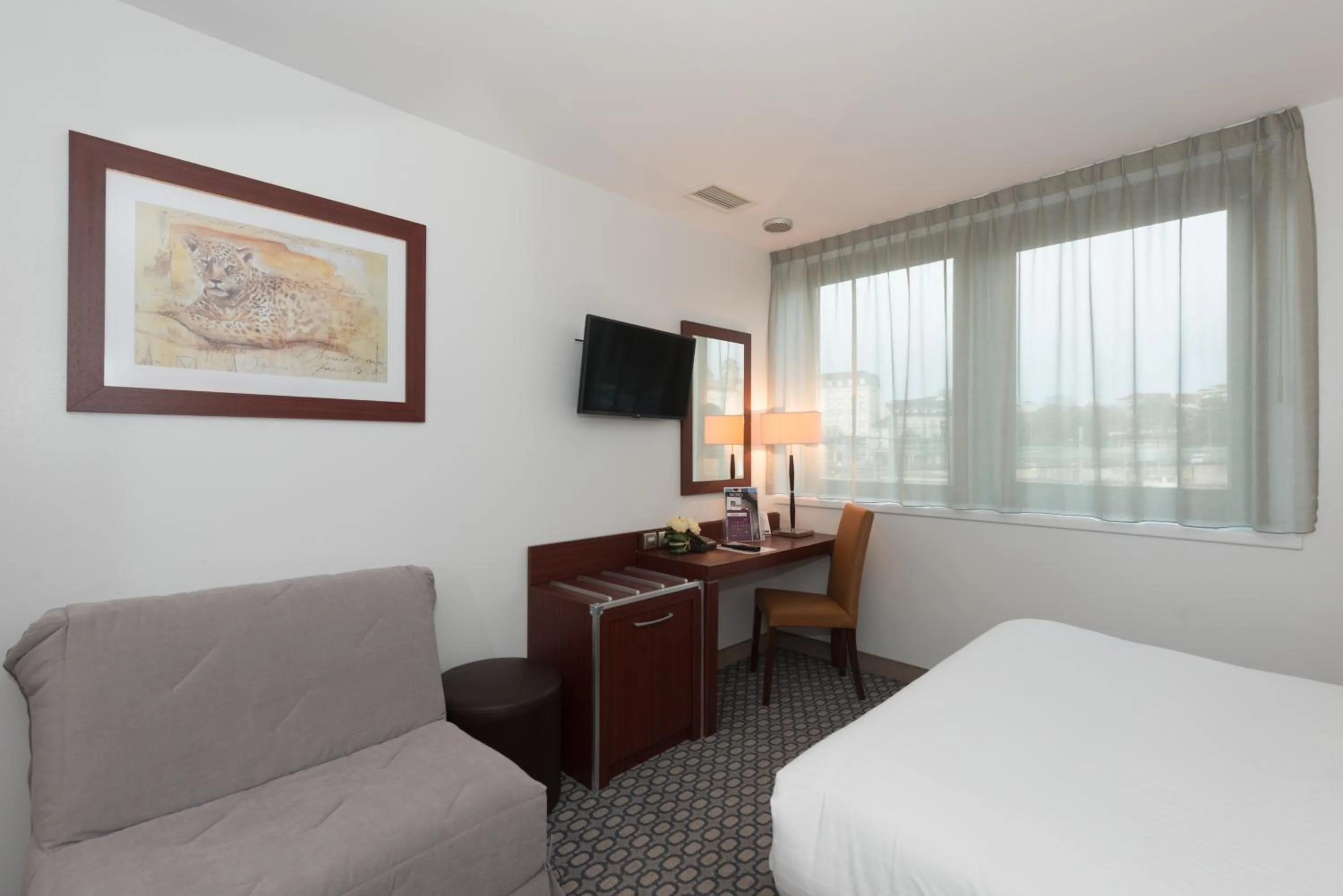 Photo of the whole room, Bed in Kyriad Limoges Centre Gare - Atrium