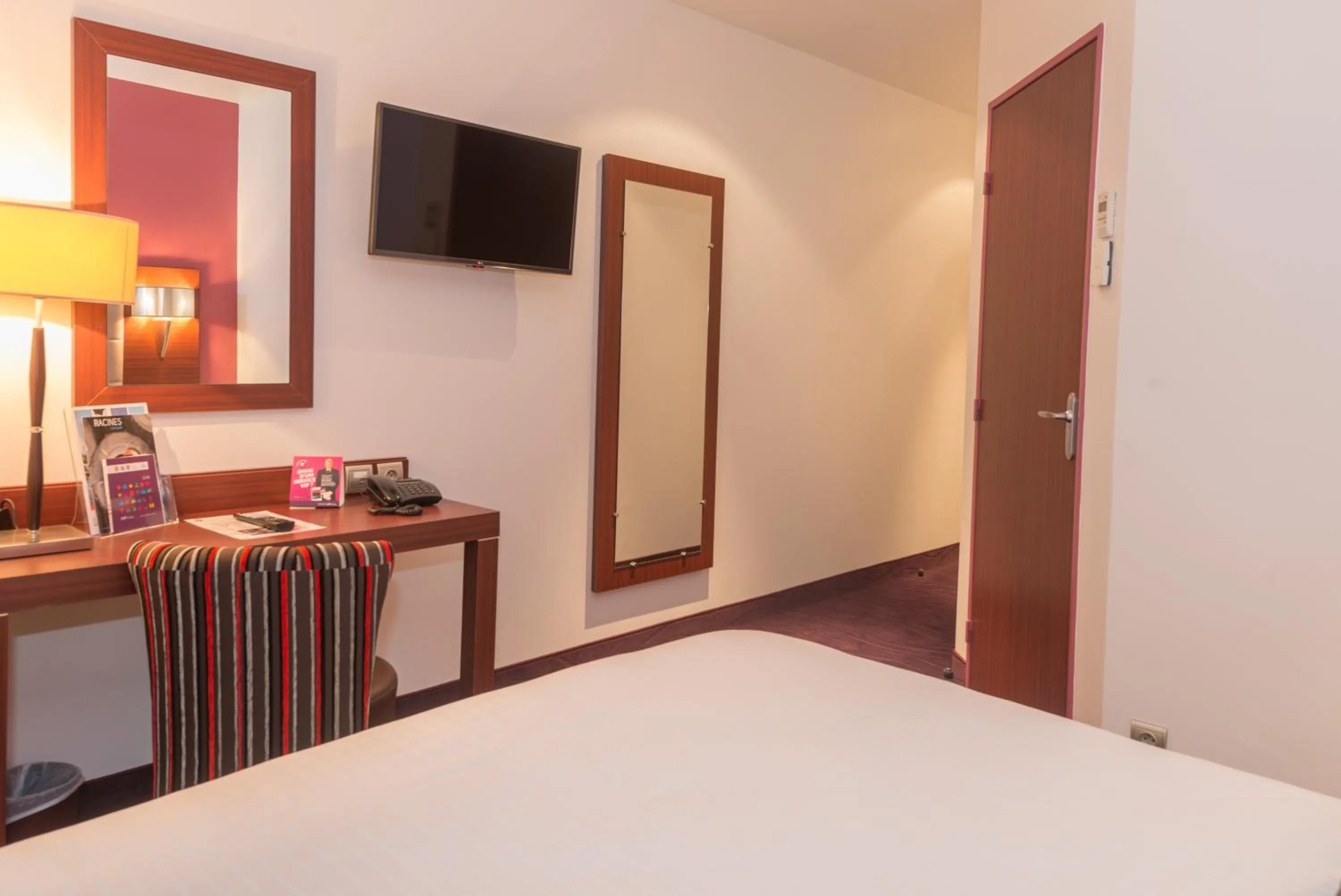 Photo of the whole room, Bed in Kyriad Limoges Centre Gare - Atrium