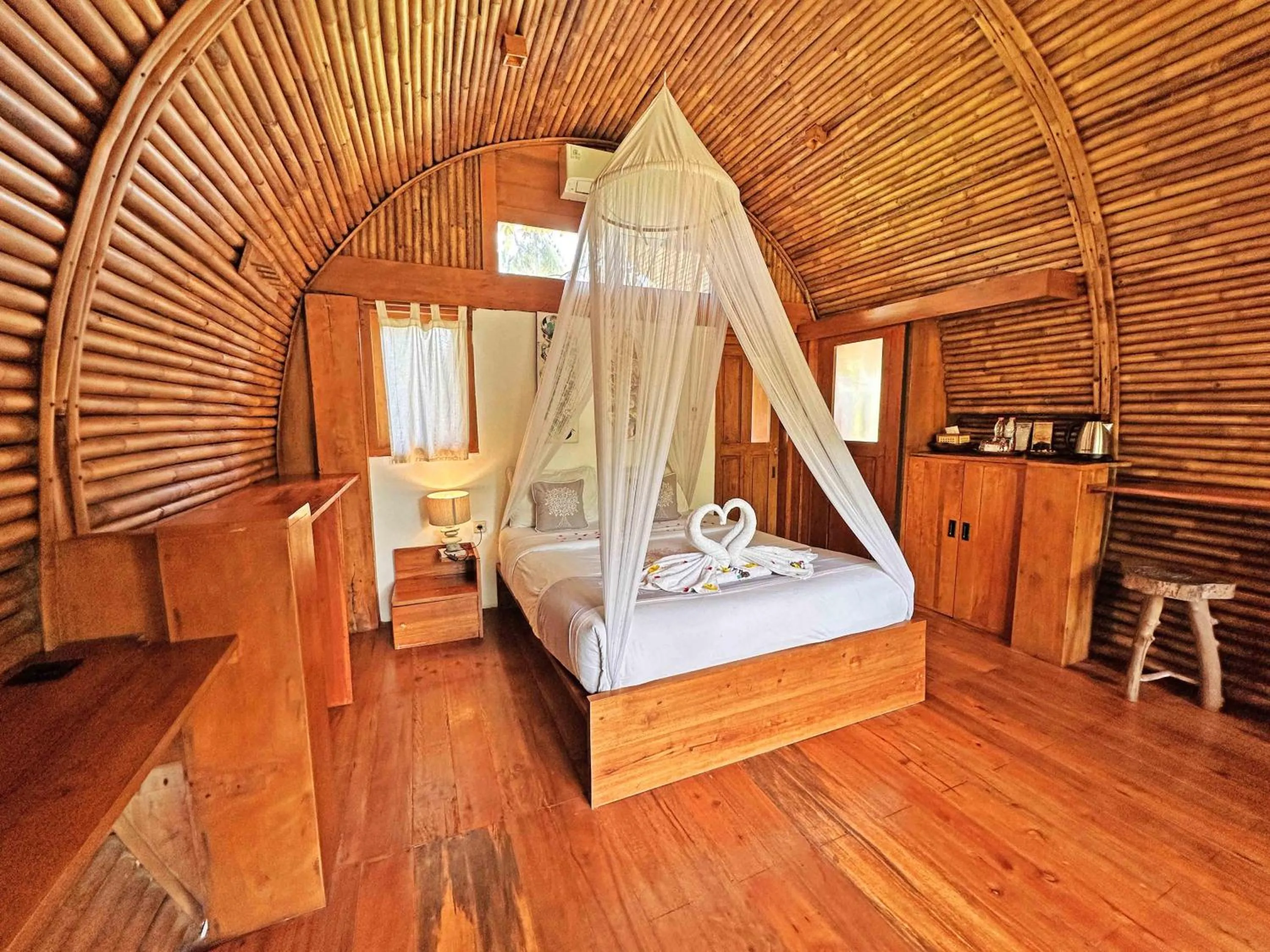 Bed in Lagoona Beach Bungalows - Eco Bungalows Batukaras