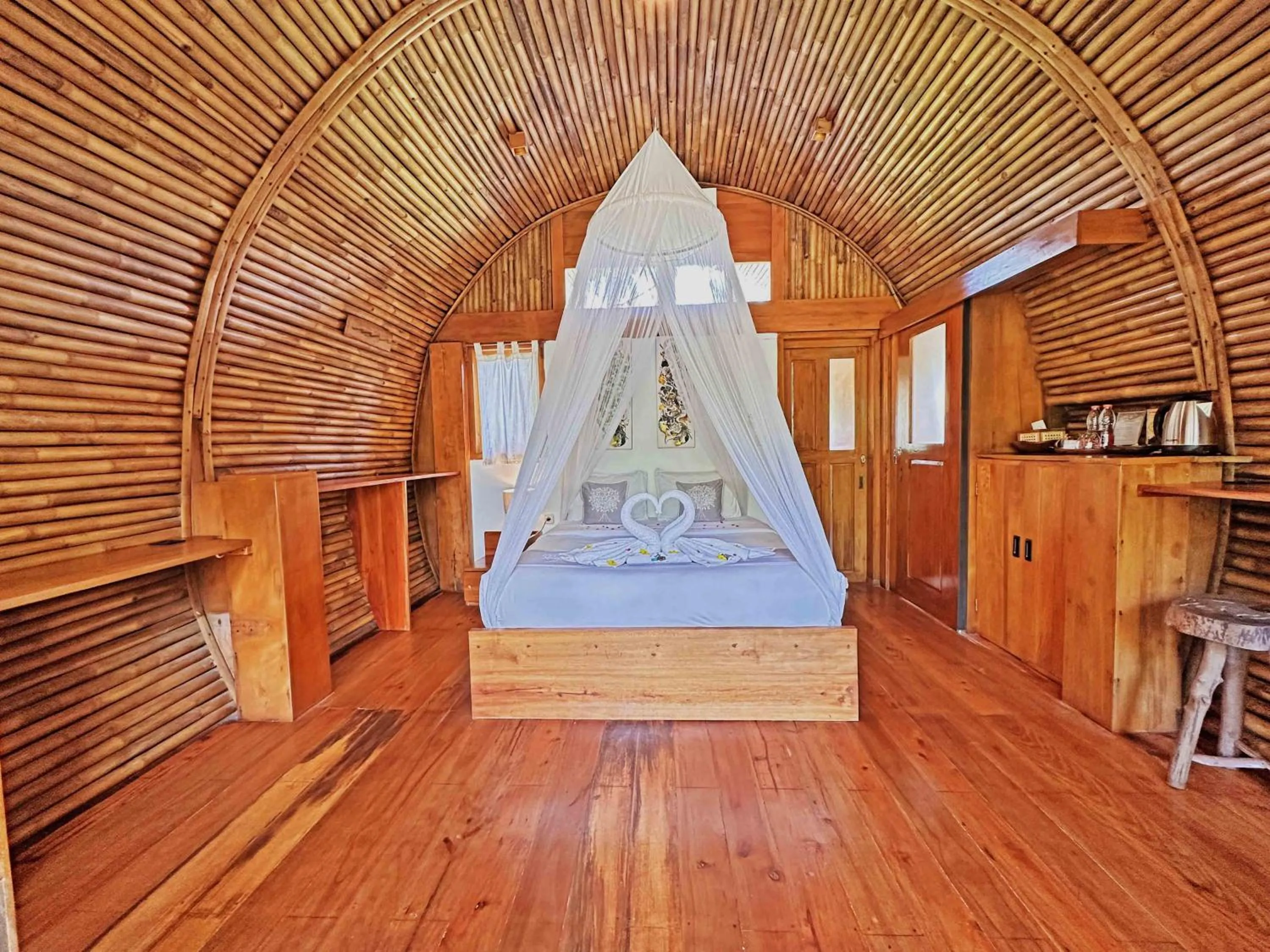 Seating area, Bed in Lagoona Beach Bungalows - Eco Bungalows Batukaras