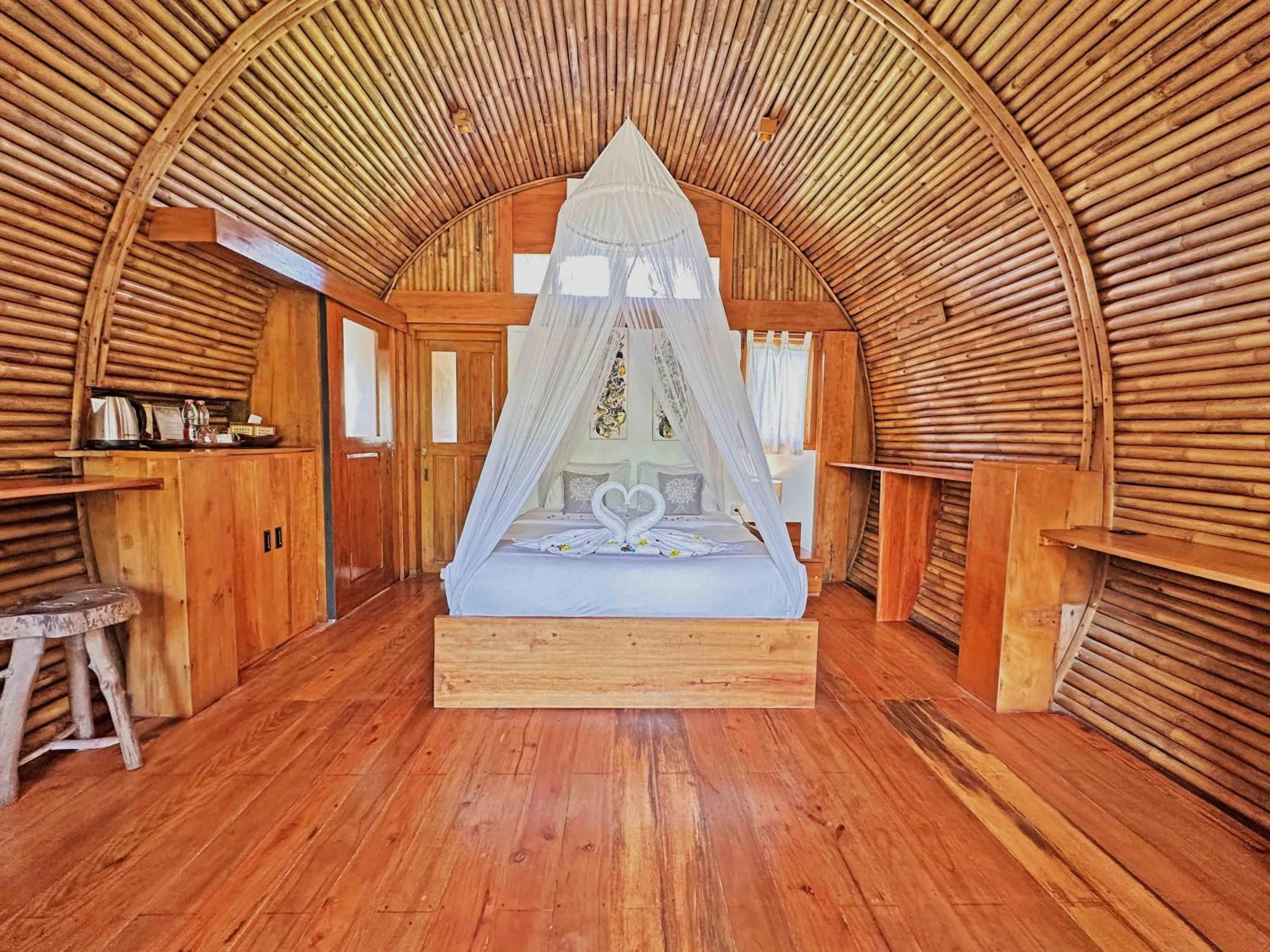 Photo of the whole room, Bed in Lagoona Beach Bungalows - Eco Bungalows Batukaras