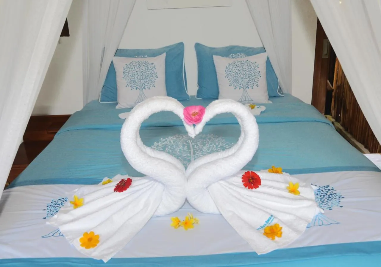 Bedroom, Bed in Lagoona Beach Bungalows - Eco Bungalows Batukaras