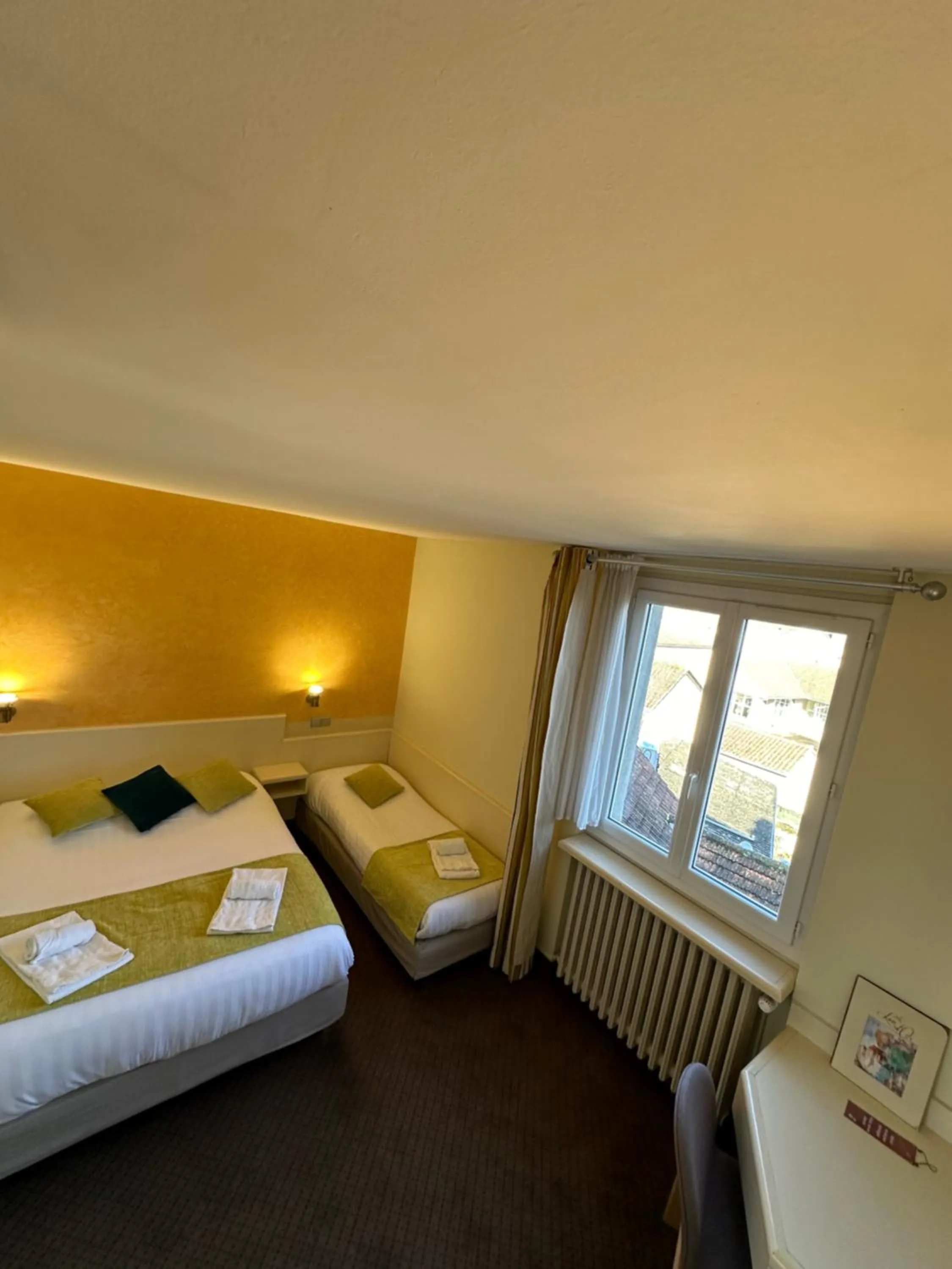 Bedroom, Bed in Logis Hôtels - Hôtel et Restaurant Le Lion d'Or