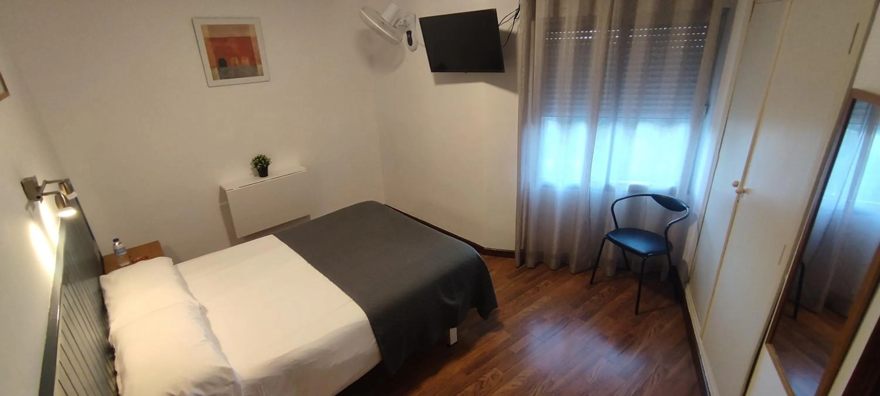 Bed in Hostal Cruce