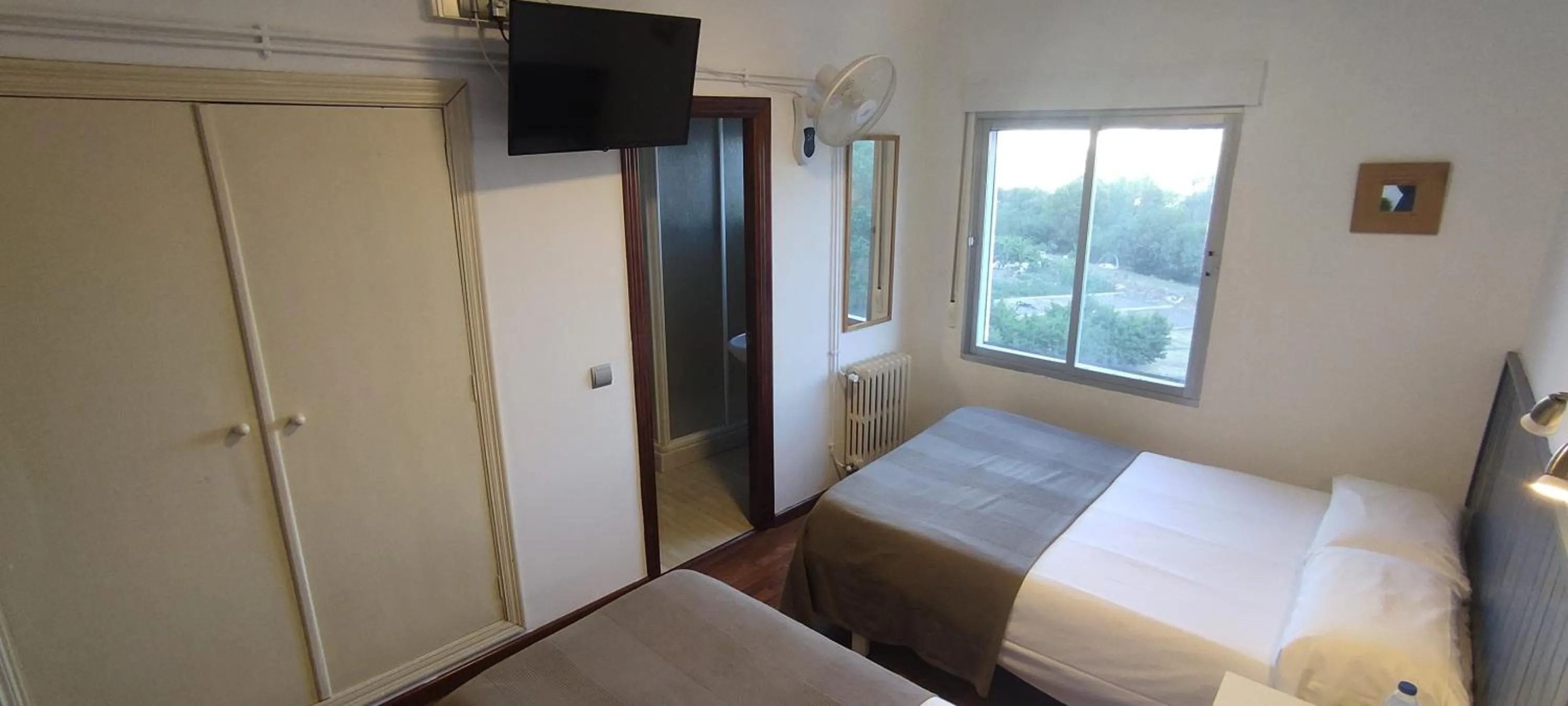 Bed in Hostal Cruce