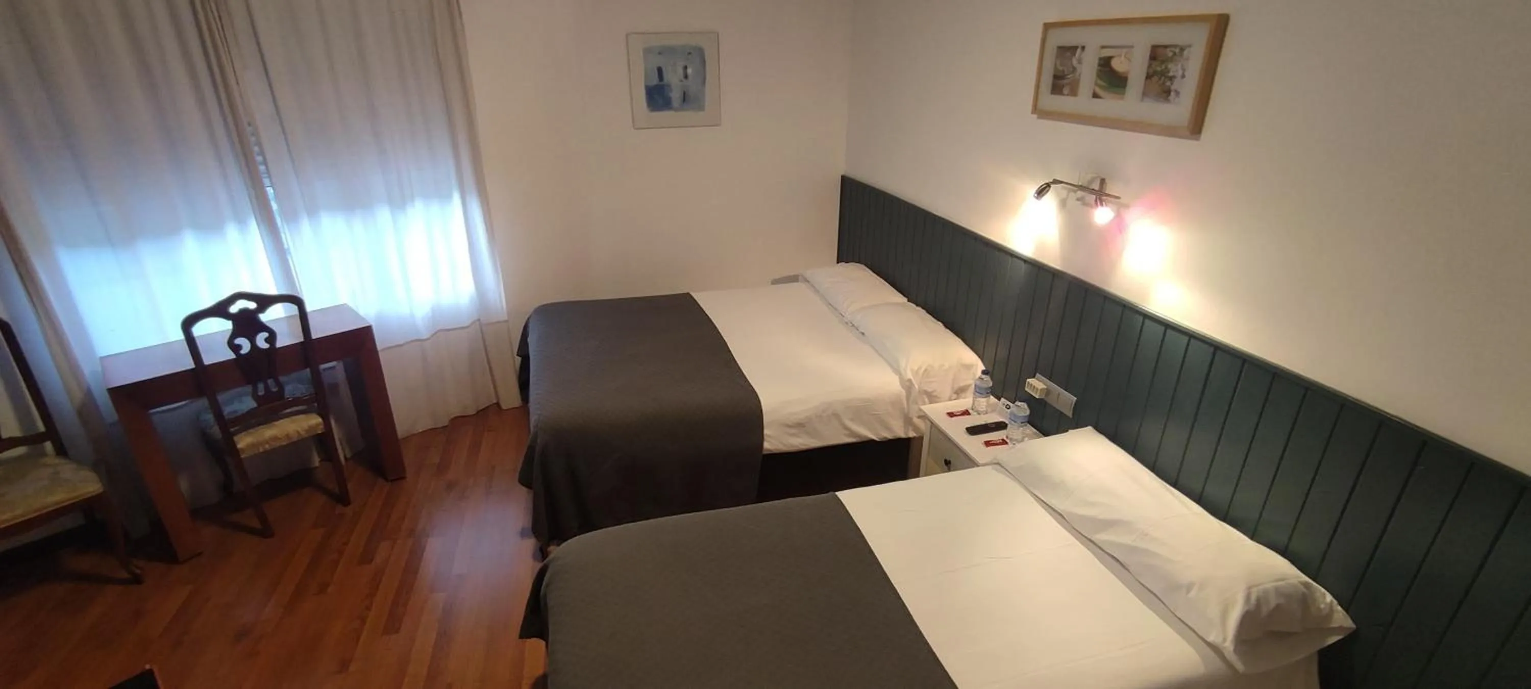 Bed in Hostal Cruce
