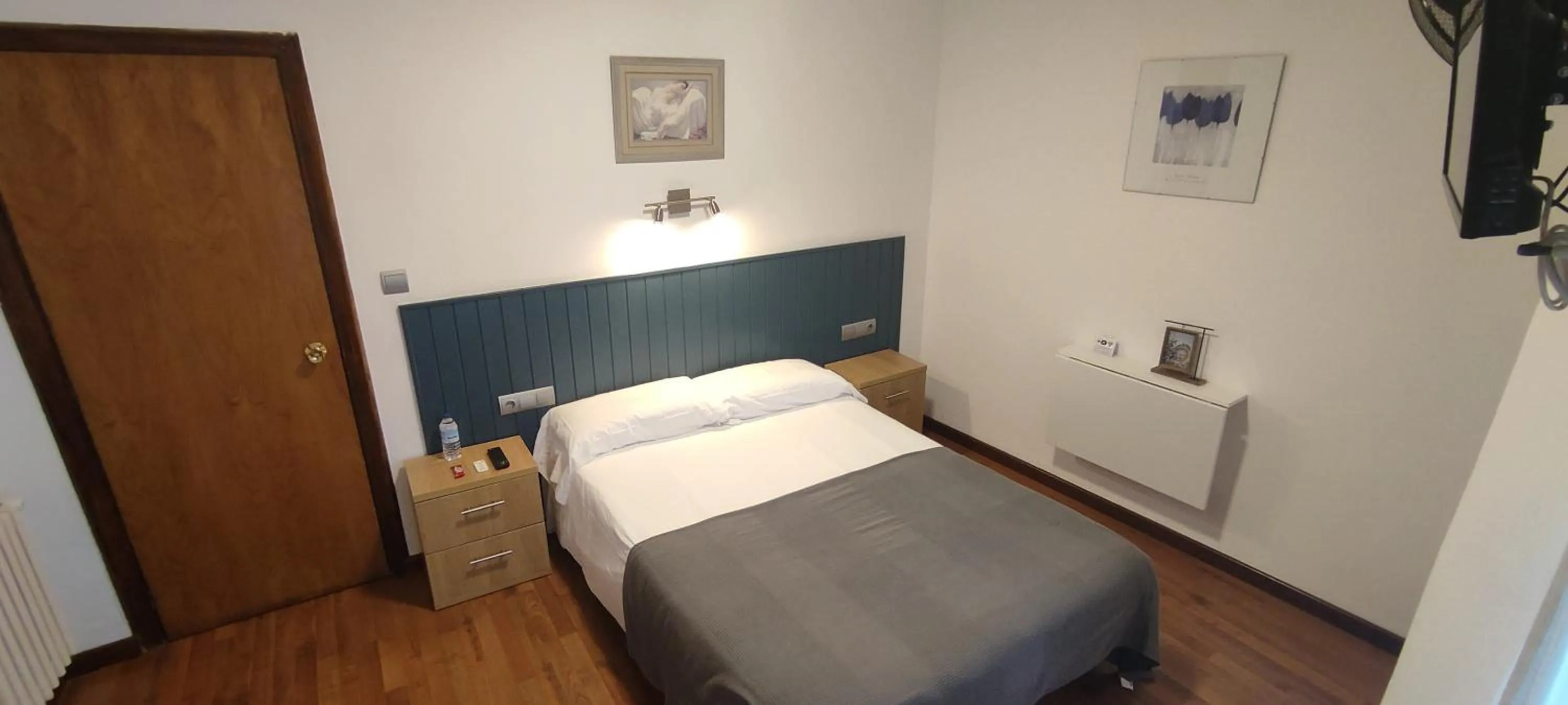 Bed in Hostal Cruce
