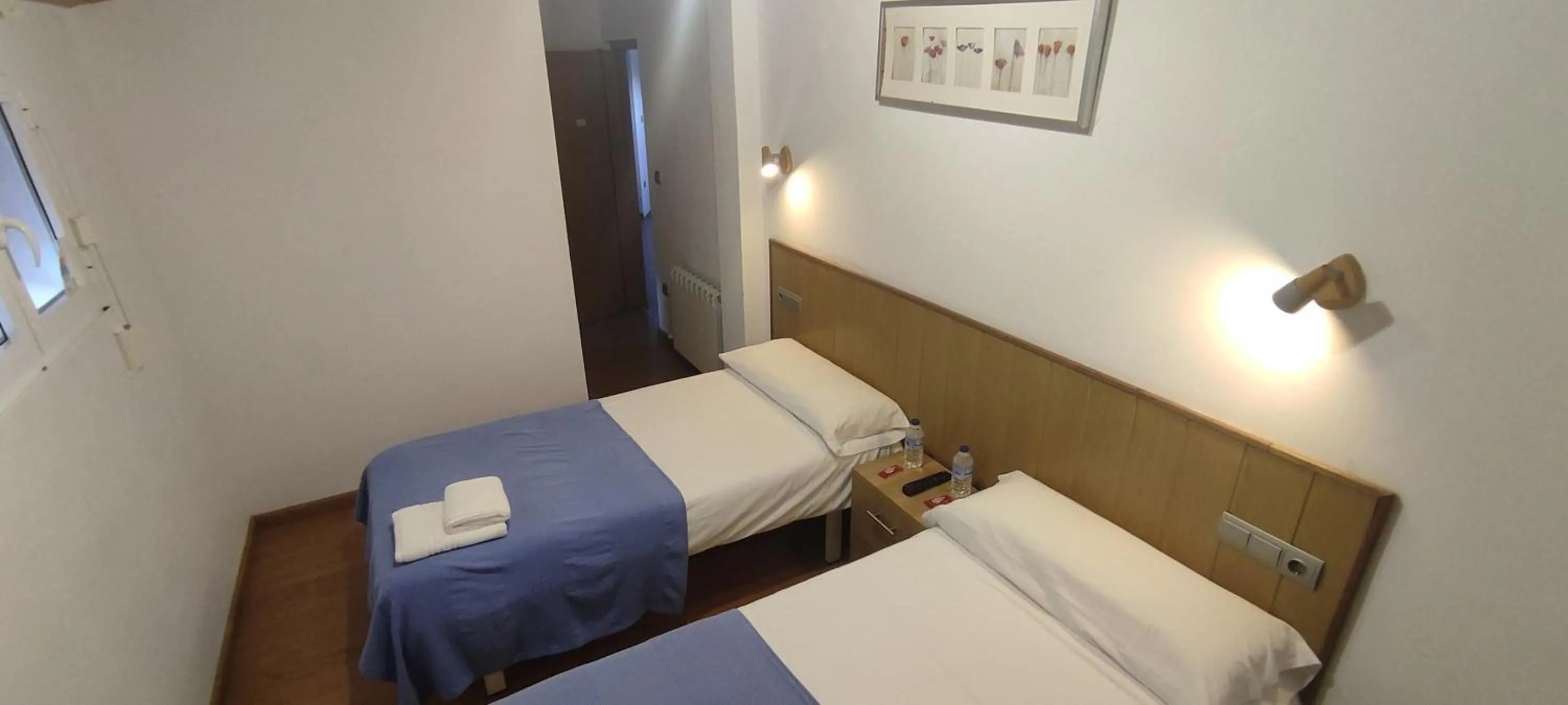 Bed in Hostal Cruce