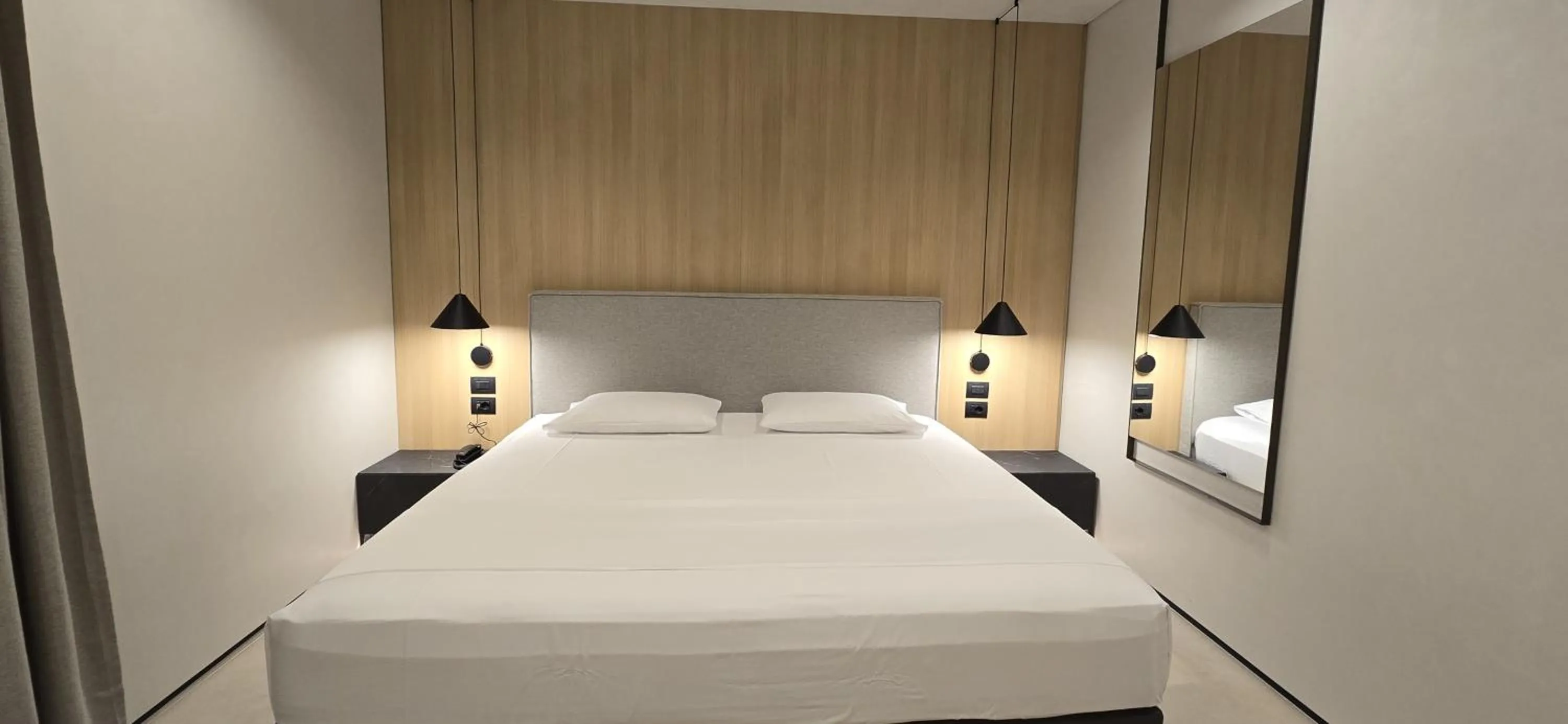 Bed in Lion Gate Hotel