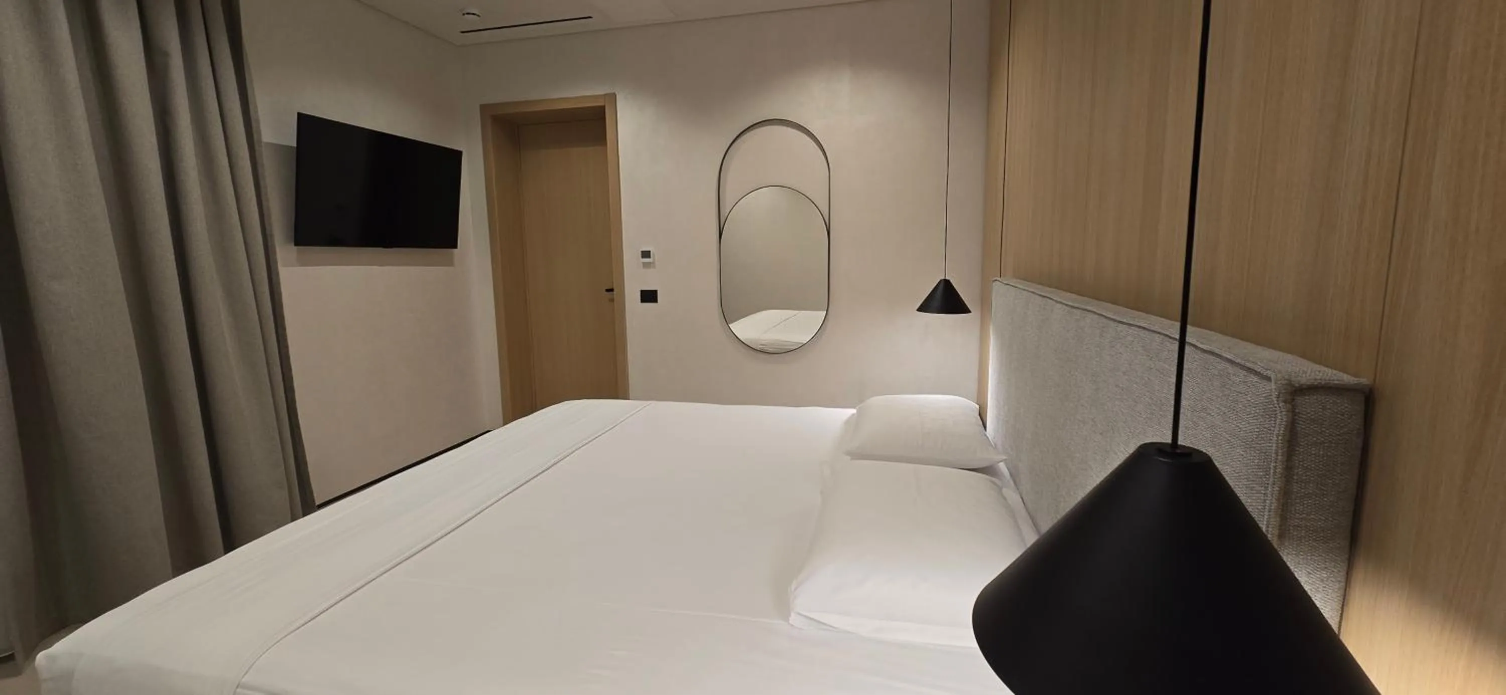 Bed in Lion Gate Hotel