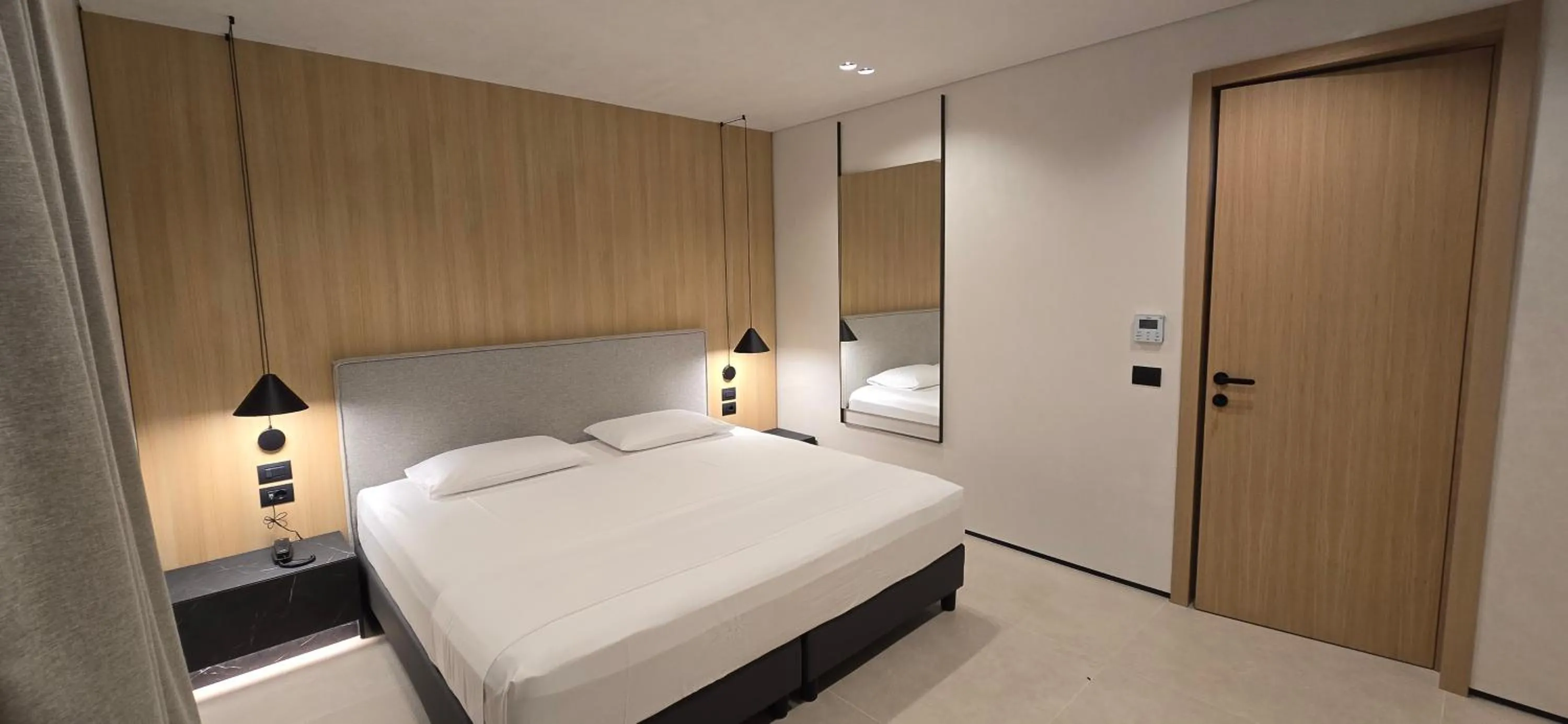 Bed in Lion Gate Hotel