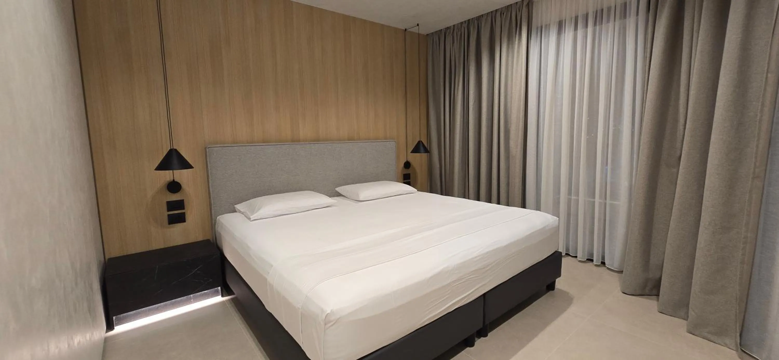 Bed in Lion Gate Hotel