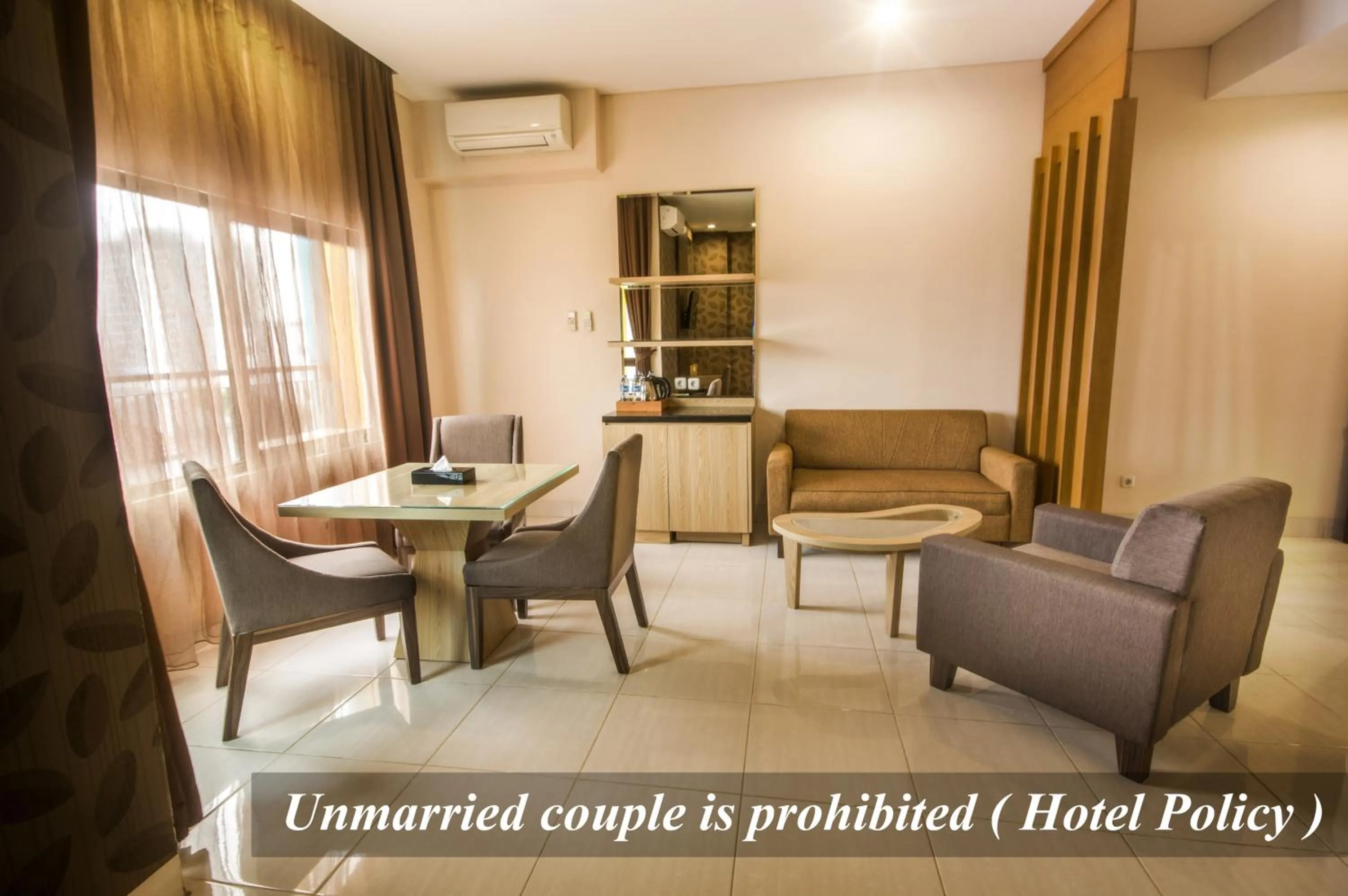 Living room in Hotel Gren Alia Jakarta