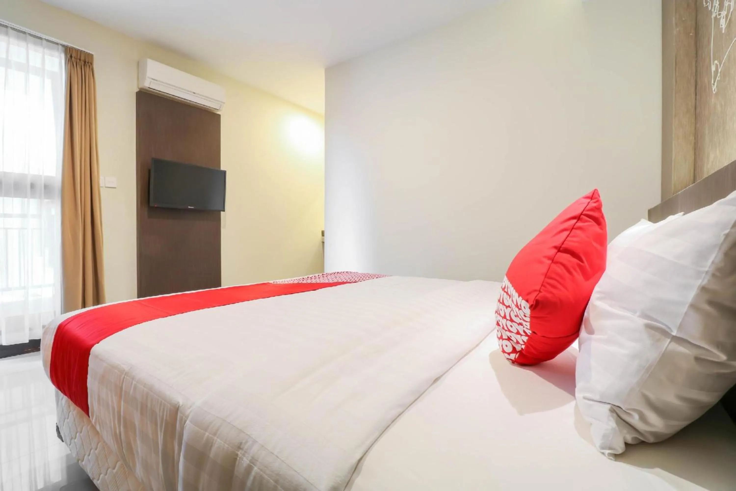 Bedroom in Hotel O Kuta Near Sunset Road Formerly Balitone Residence