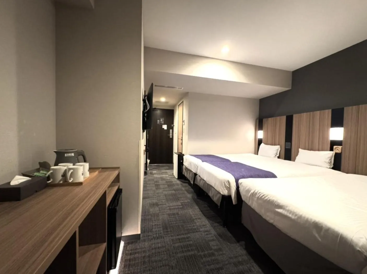 Bed in hotel MONday Kyoto Karasuma Nijo