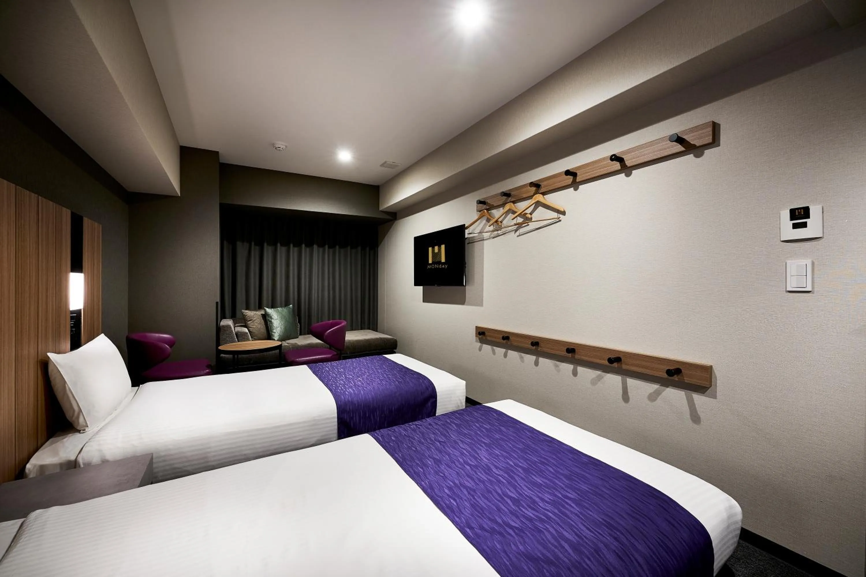 Bed in hotel MONday Kyoto Karasuma Nijo