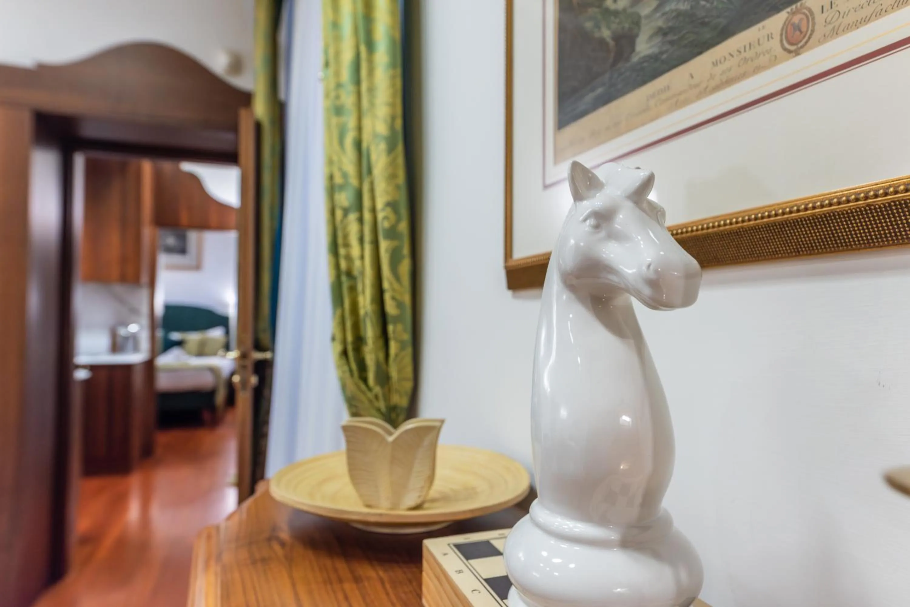 Decorative detail, Bed in Pantheon Antique Suite