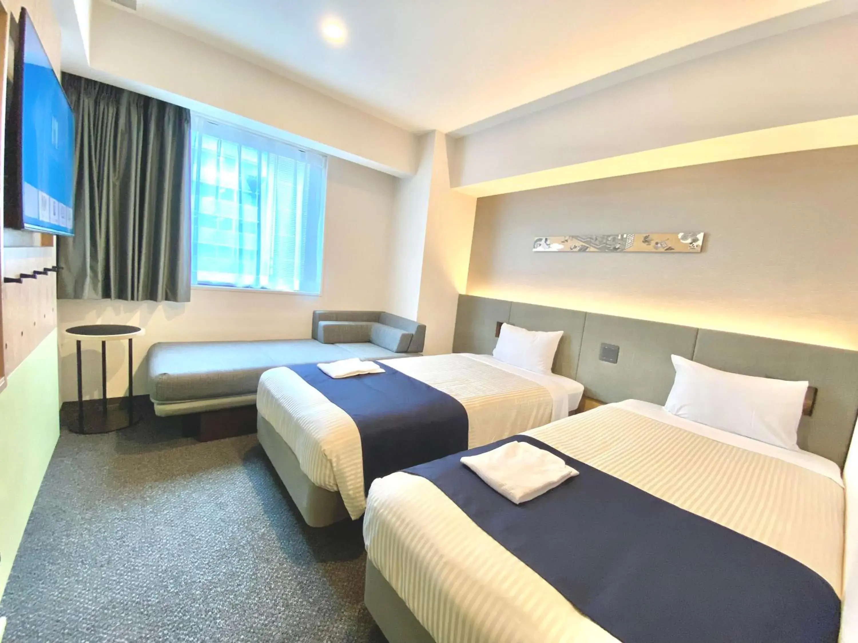 Bed in hotel MONday Premium Ueno Okachimachi Bed in hotel MONday Premium Ueno Okachimachi