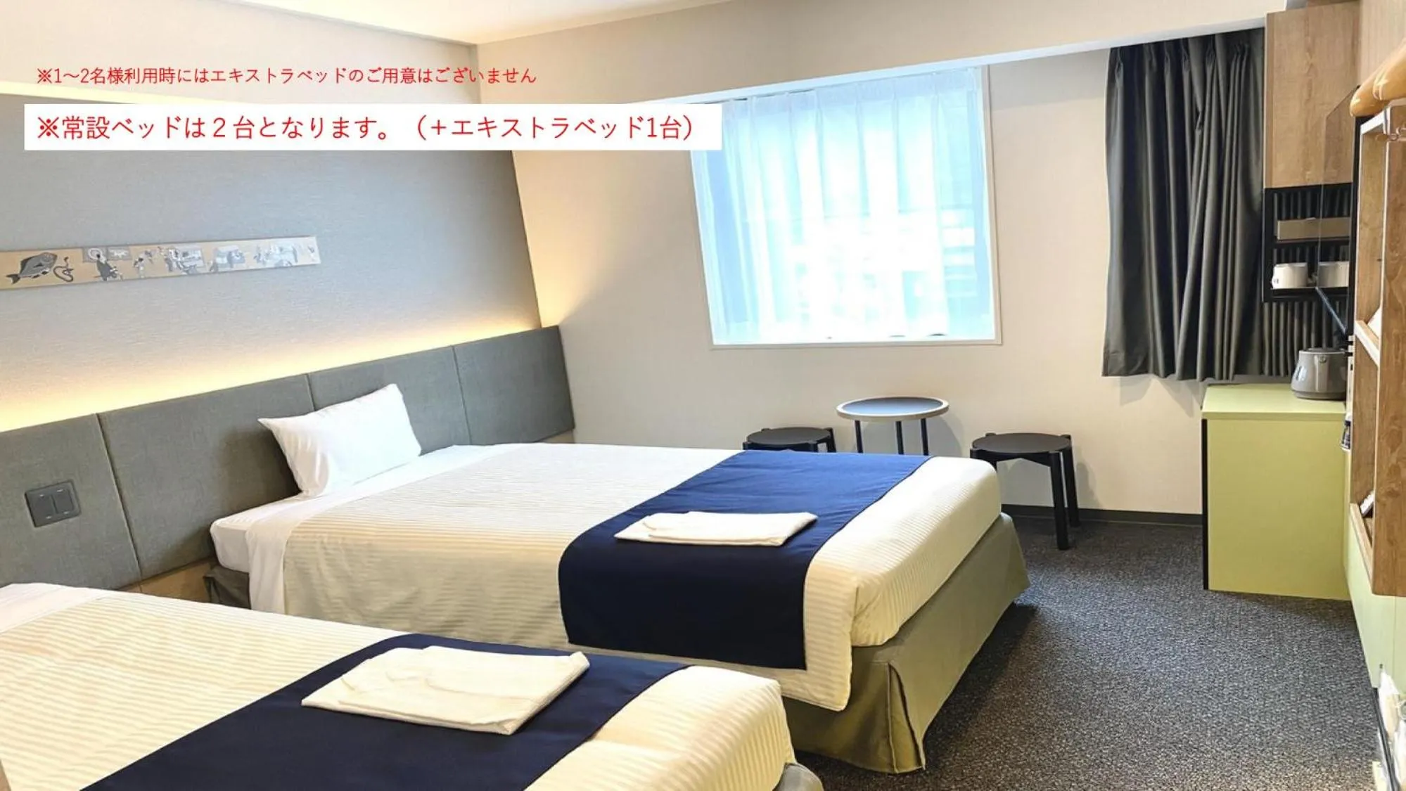 Bed in hotel MONday Premium Ueno Okachimachi