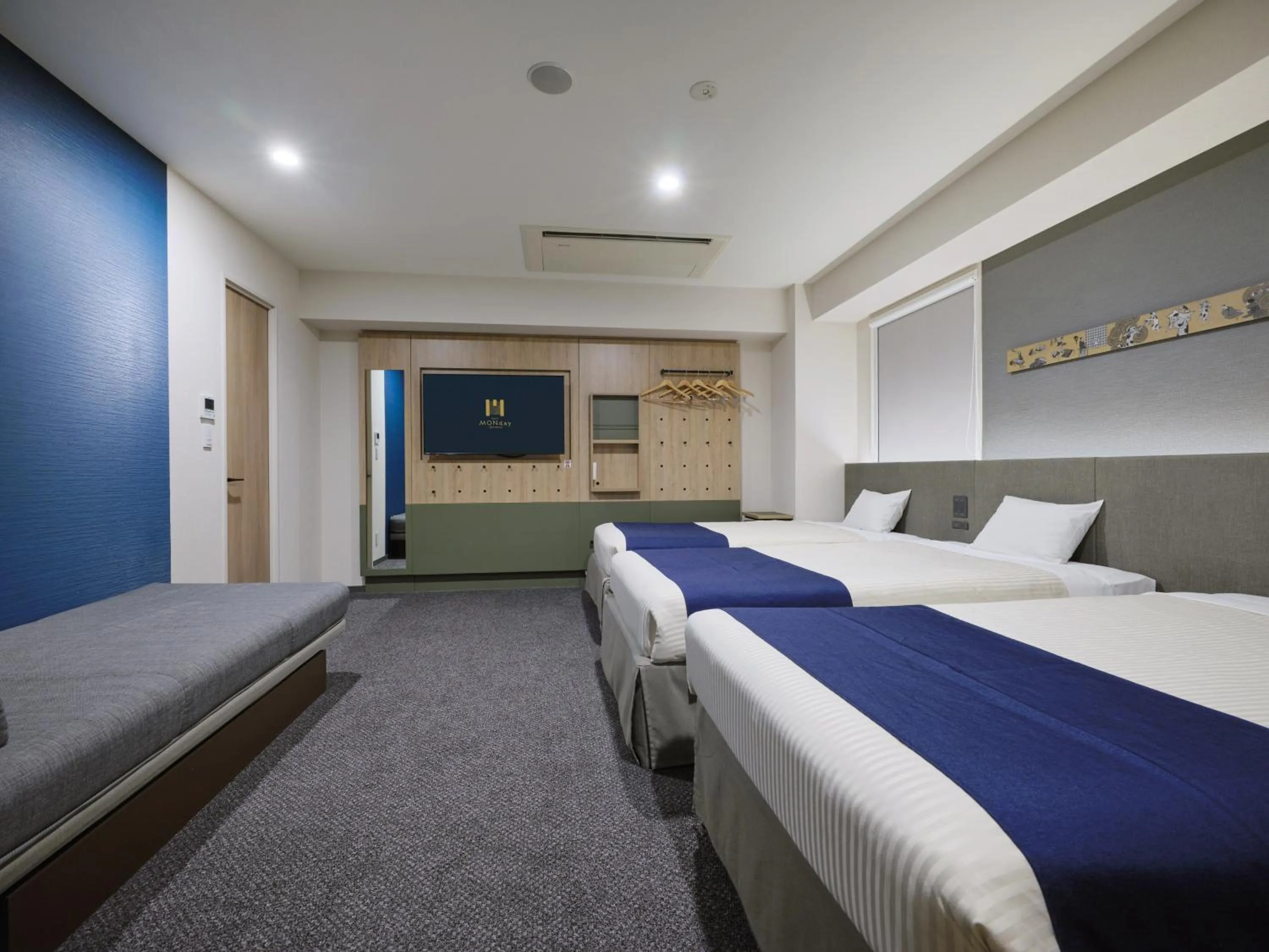 Bed in hotel MONday Premium Ueno Okachimachi