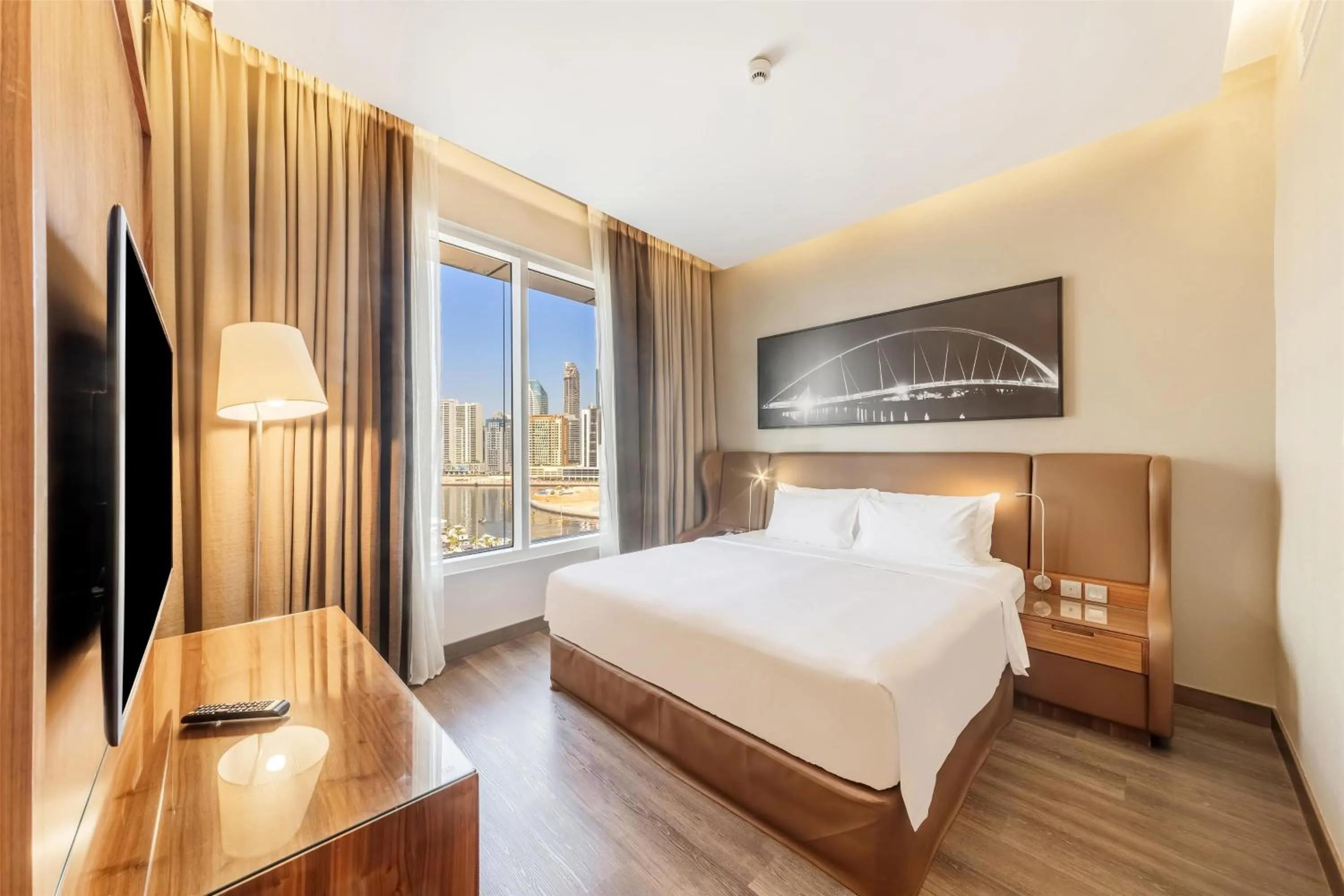 Photo of the whole room, Bed in Radisson Blu Hotel, Dubai Canal View