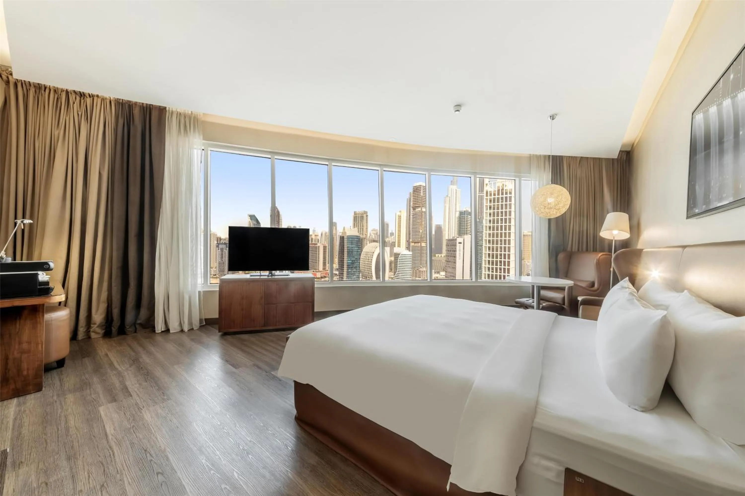 Bedroom, Bed in Radisson Blu Hotel, Dubai Canal View
