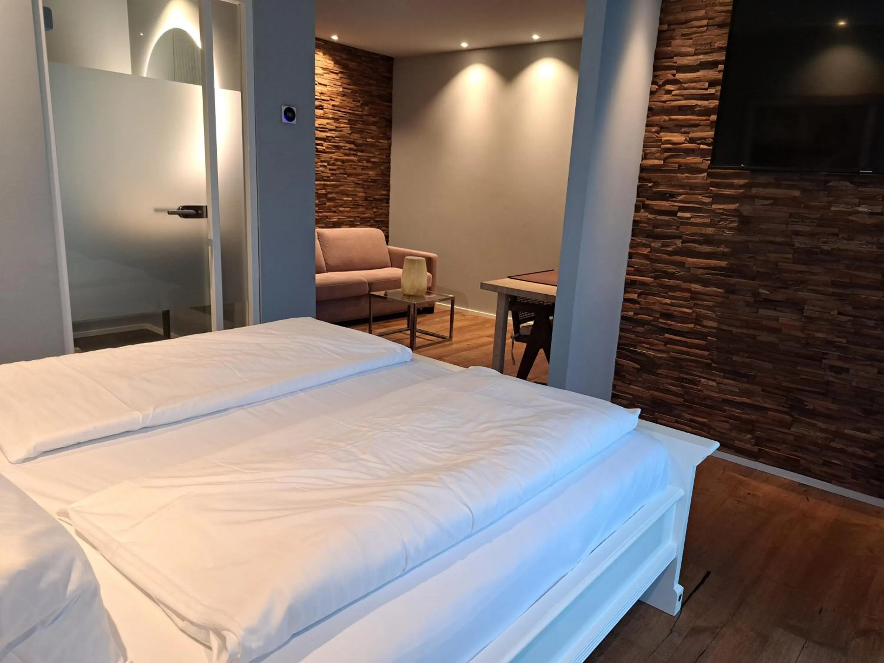 Bed in MotelplusHotel BiggeSeeFront