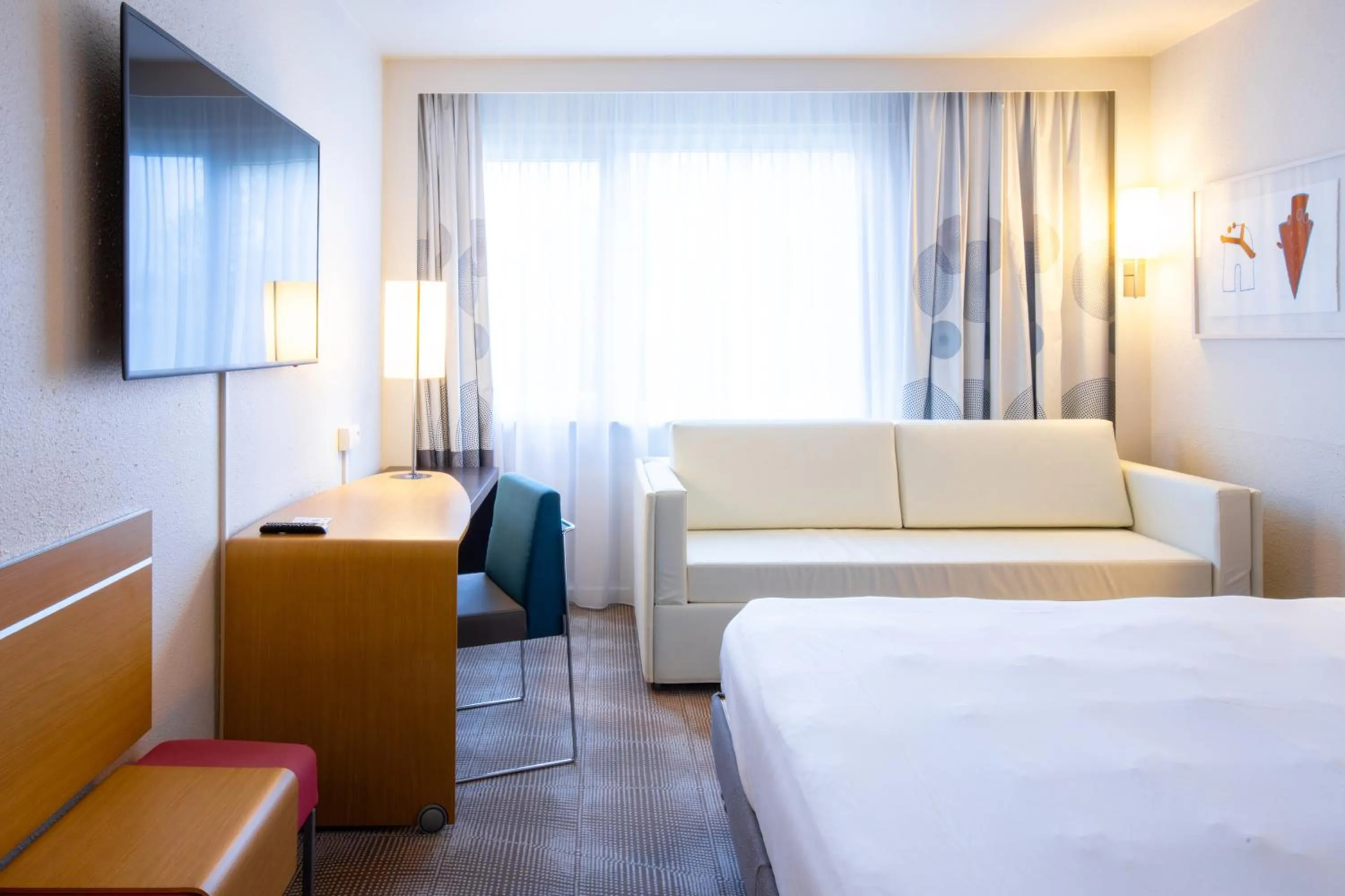 Bed in Novotel Mulhouse Bâle Fribourg