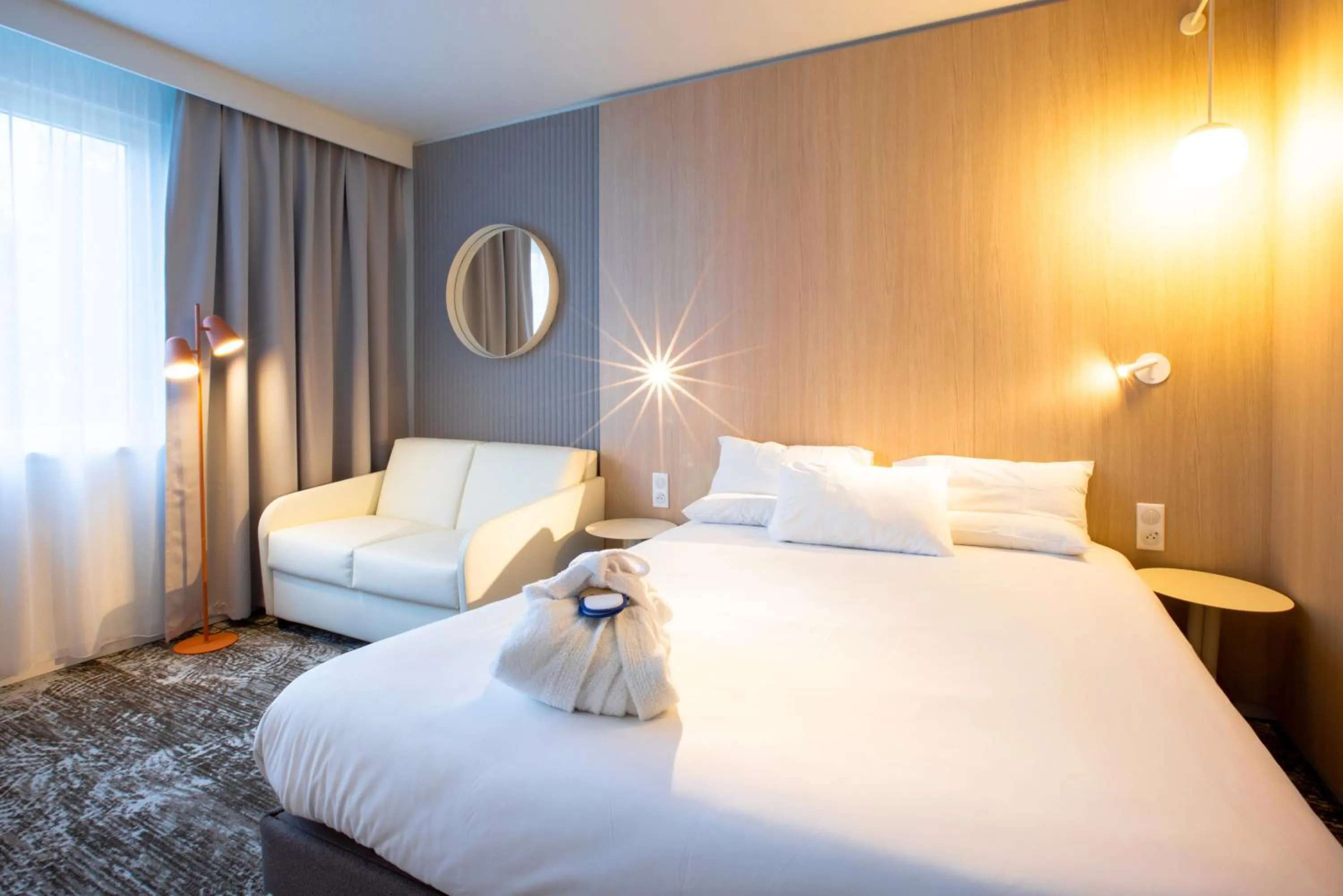 Bed in Novotel Mulhouse Bâle Fribourg