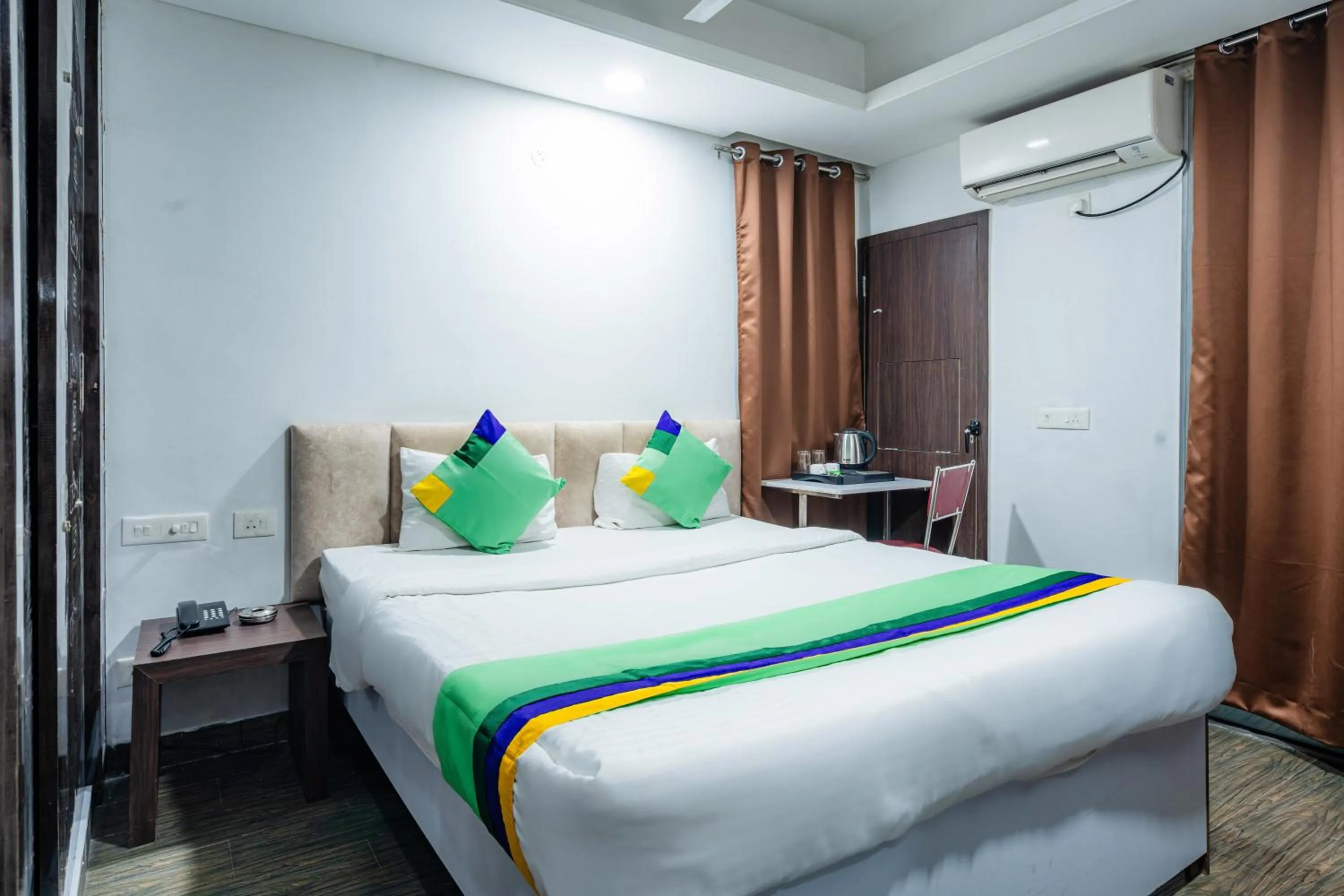 Bedroom, Bed in Treebo Silver Apartment