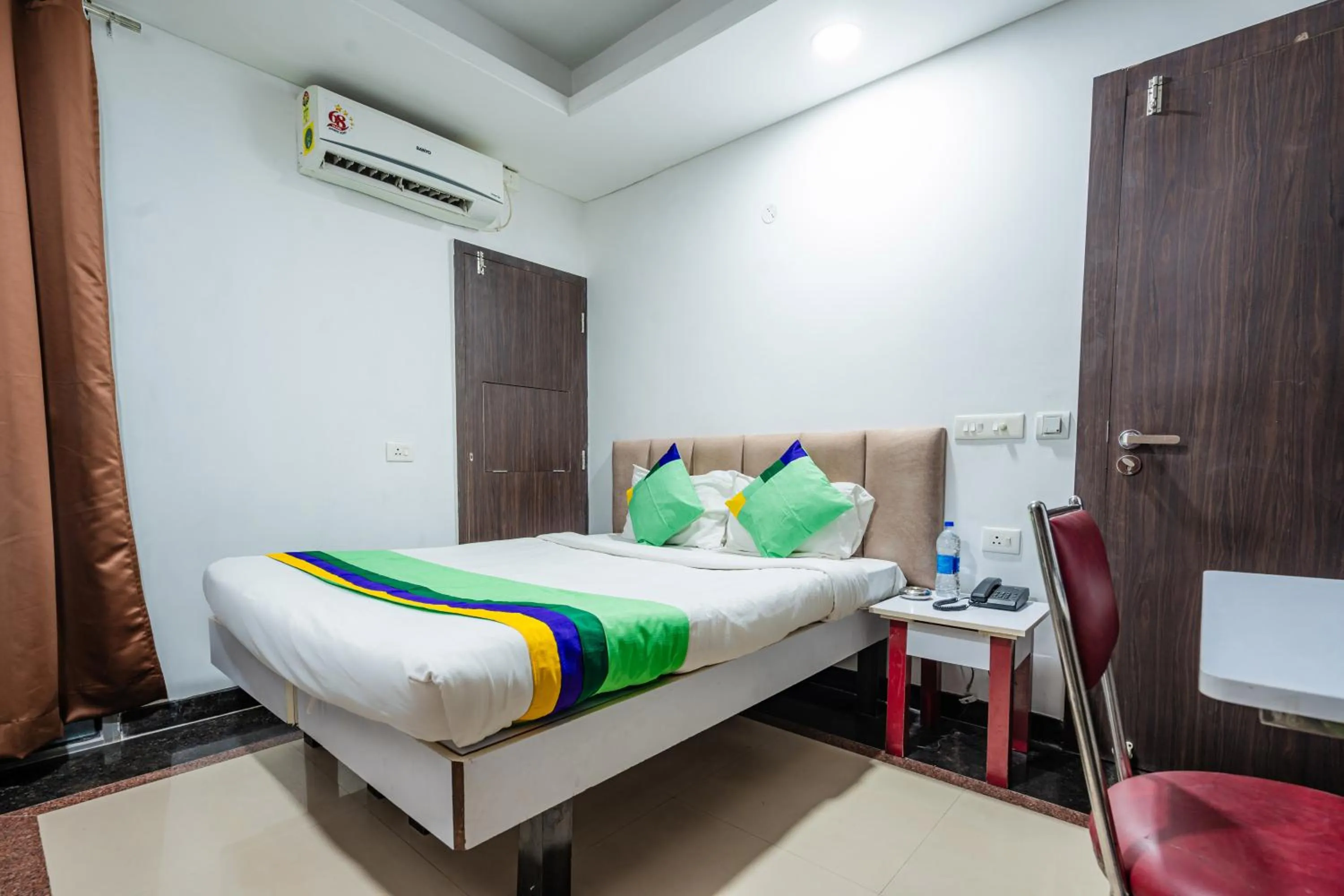 Bedroom, Bed in Treebo Silver Apartment