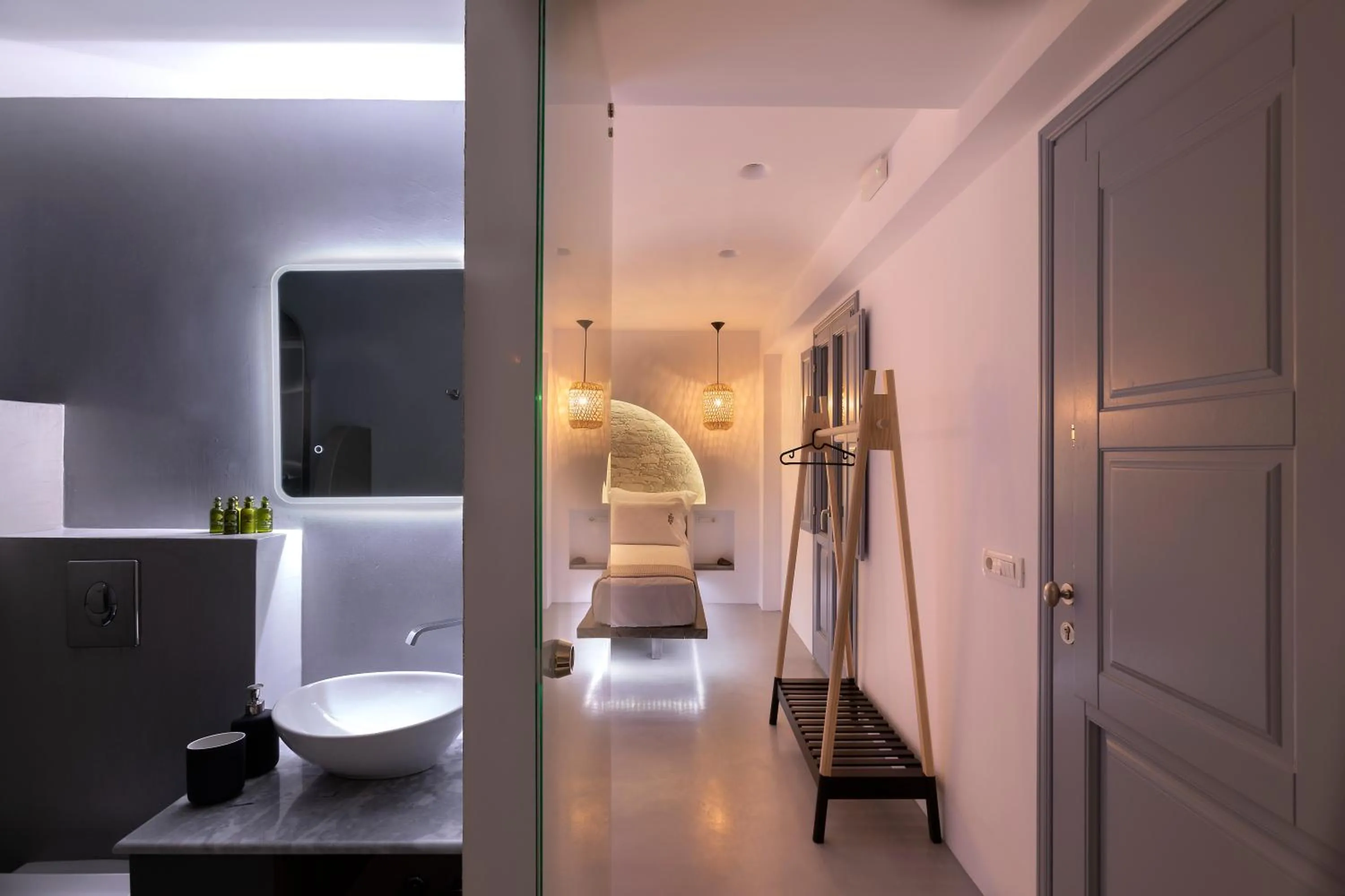 Bed in BlackStone Luxury Suites