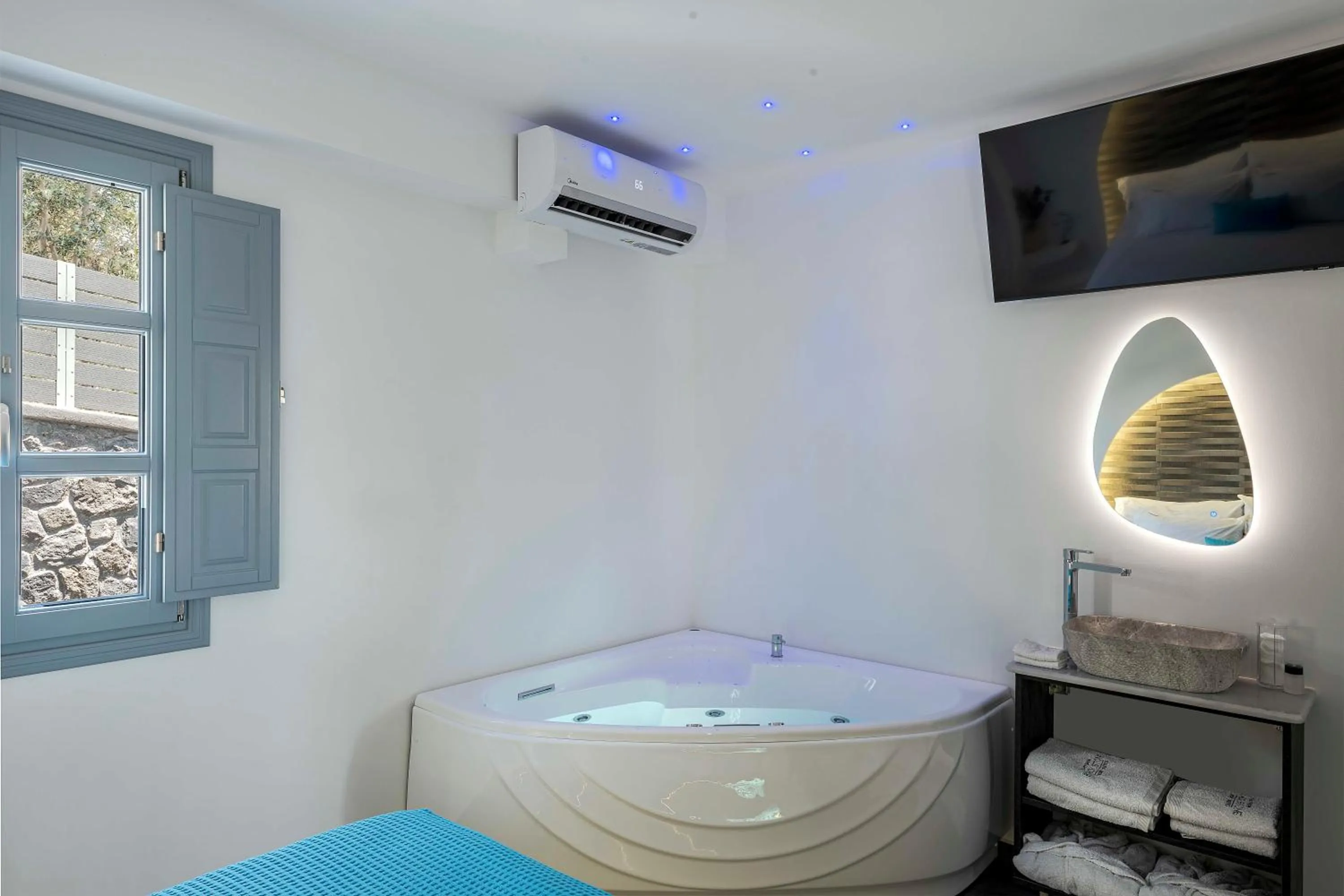 Bed in BlackStone Luxury Suites