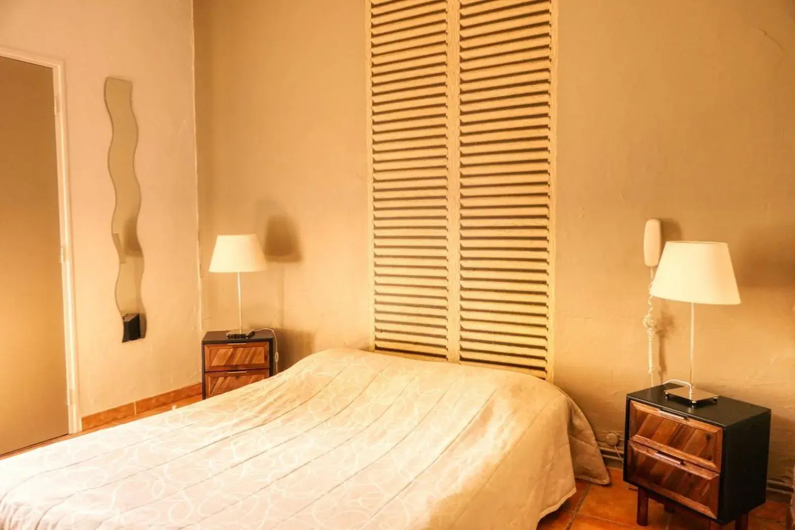 Bedroom, Bed in Au Saint Roch - Hôtel et Jardin