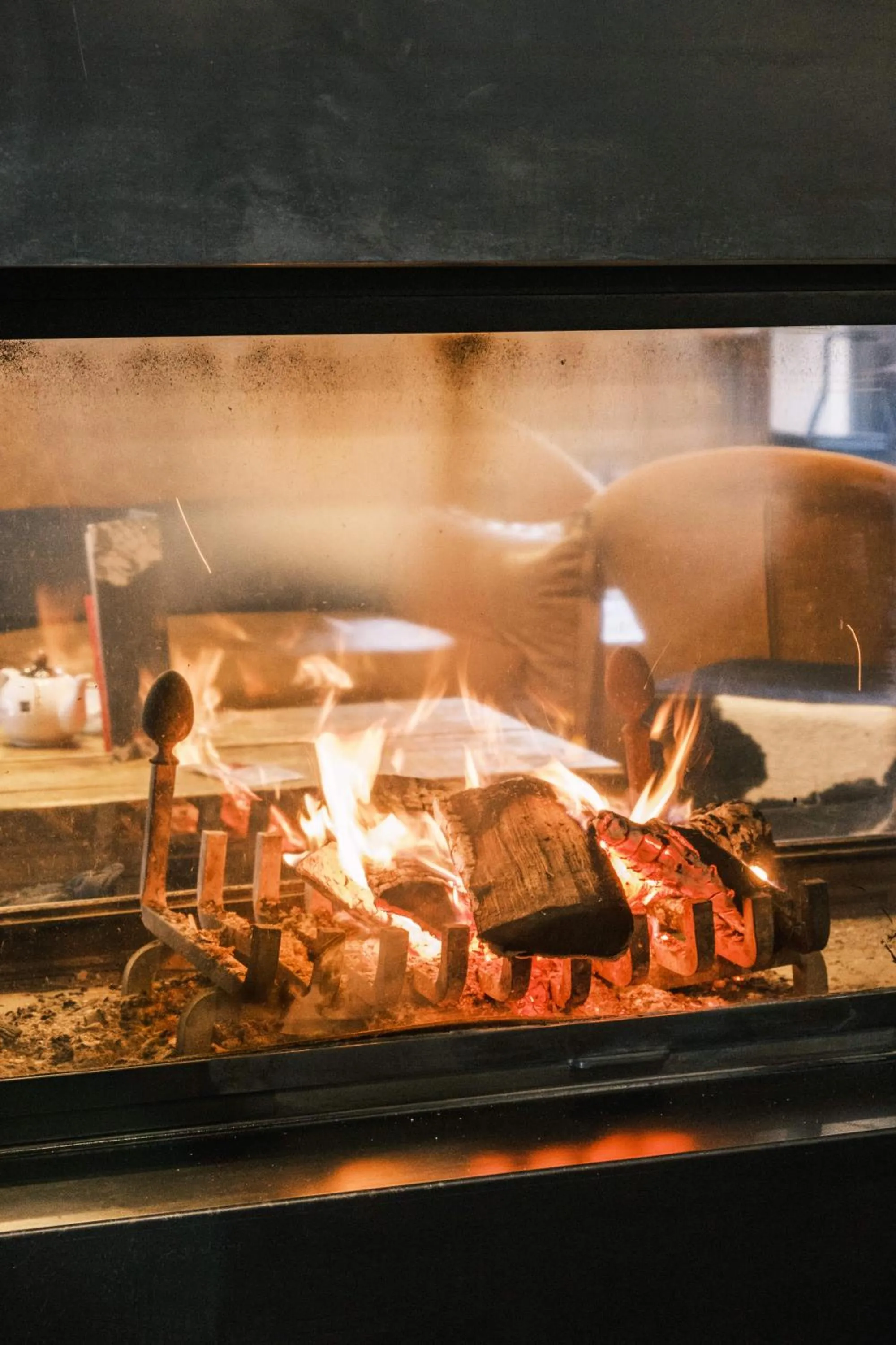 fireplace in Chalet Hôtel Le Prieuré & Spa