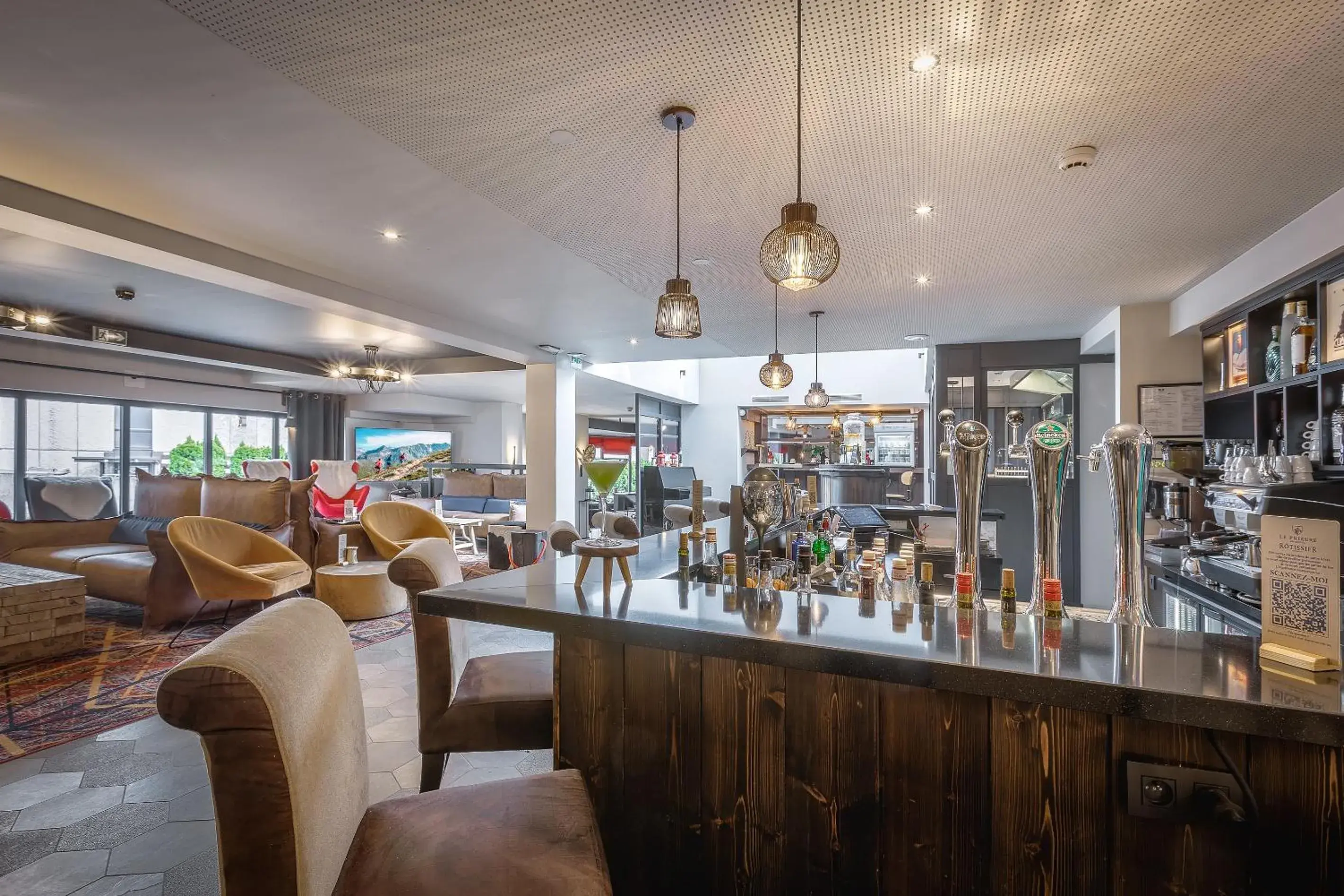 Lounge or bar in Chalet Hôtel Le Prieuré & Spa Lounge or bar in Chalet Hôtel Le Prieuré & Spa