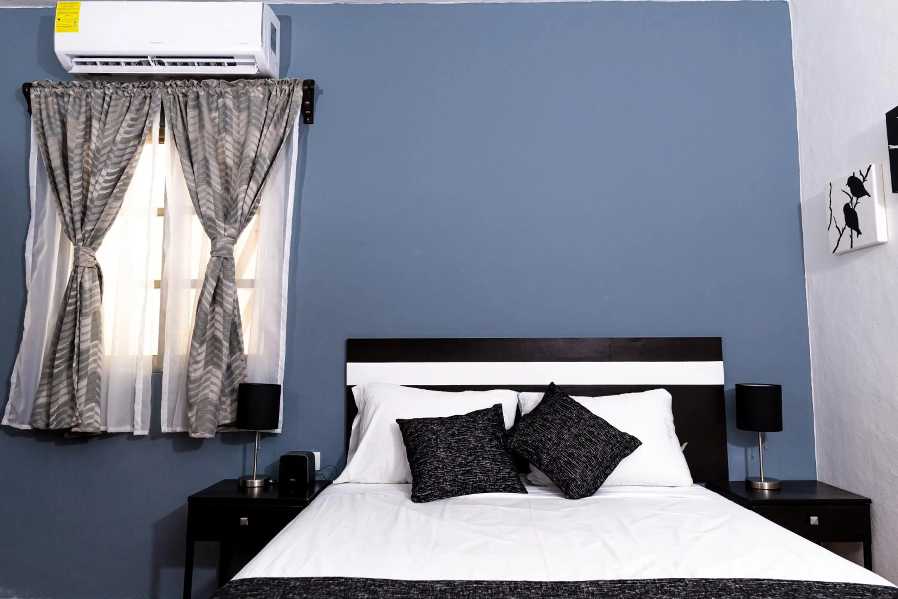 Bed in Santa Fe Studios And Suites