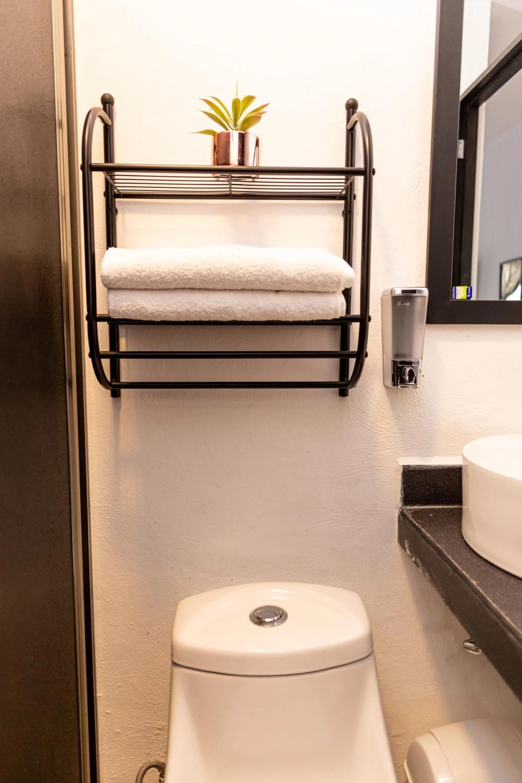 Bathroom in Santa Fe Studios And Suites