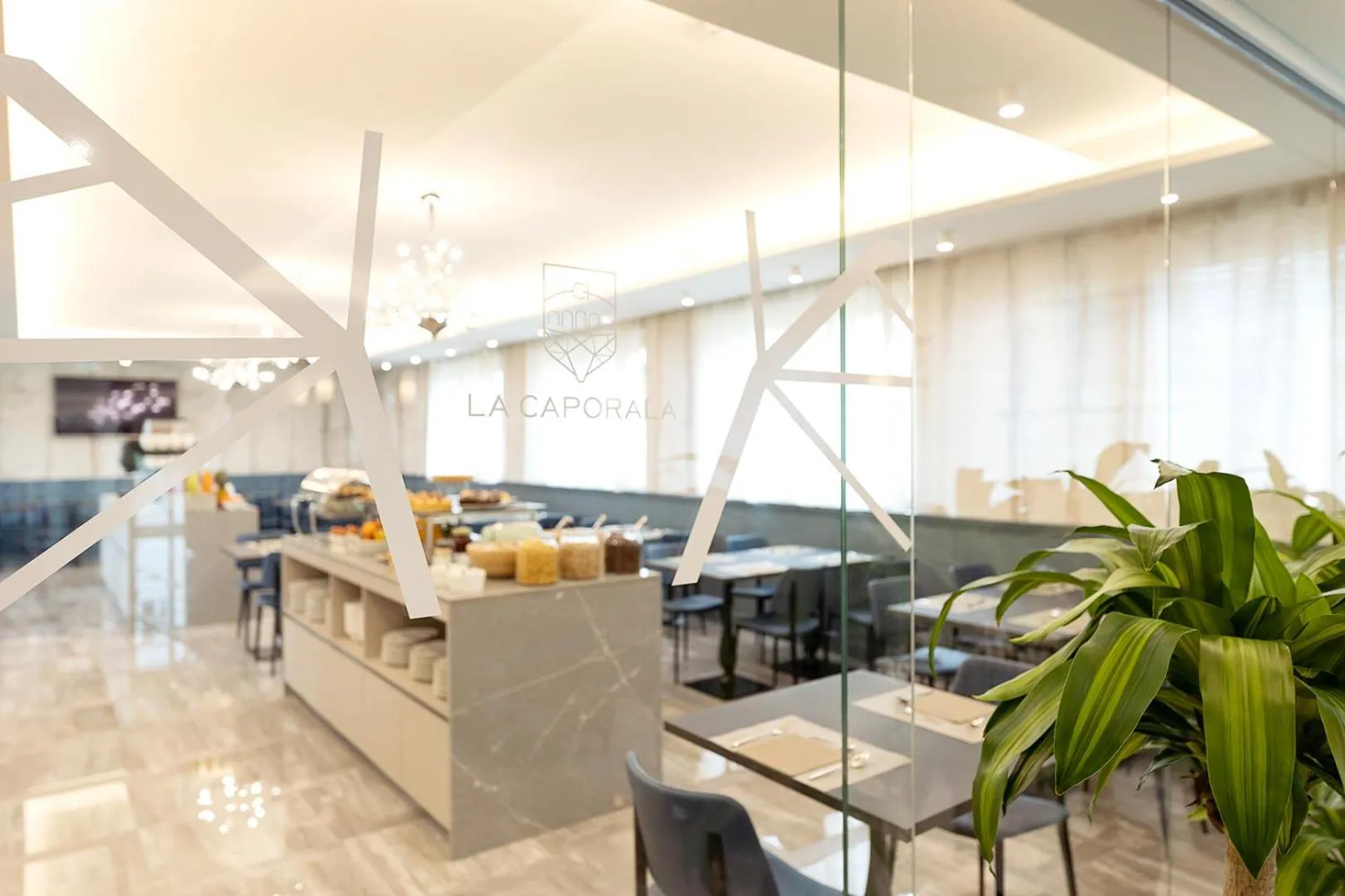 Property logo or sign in Hotel La Caporala