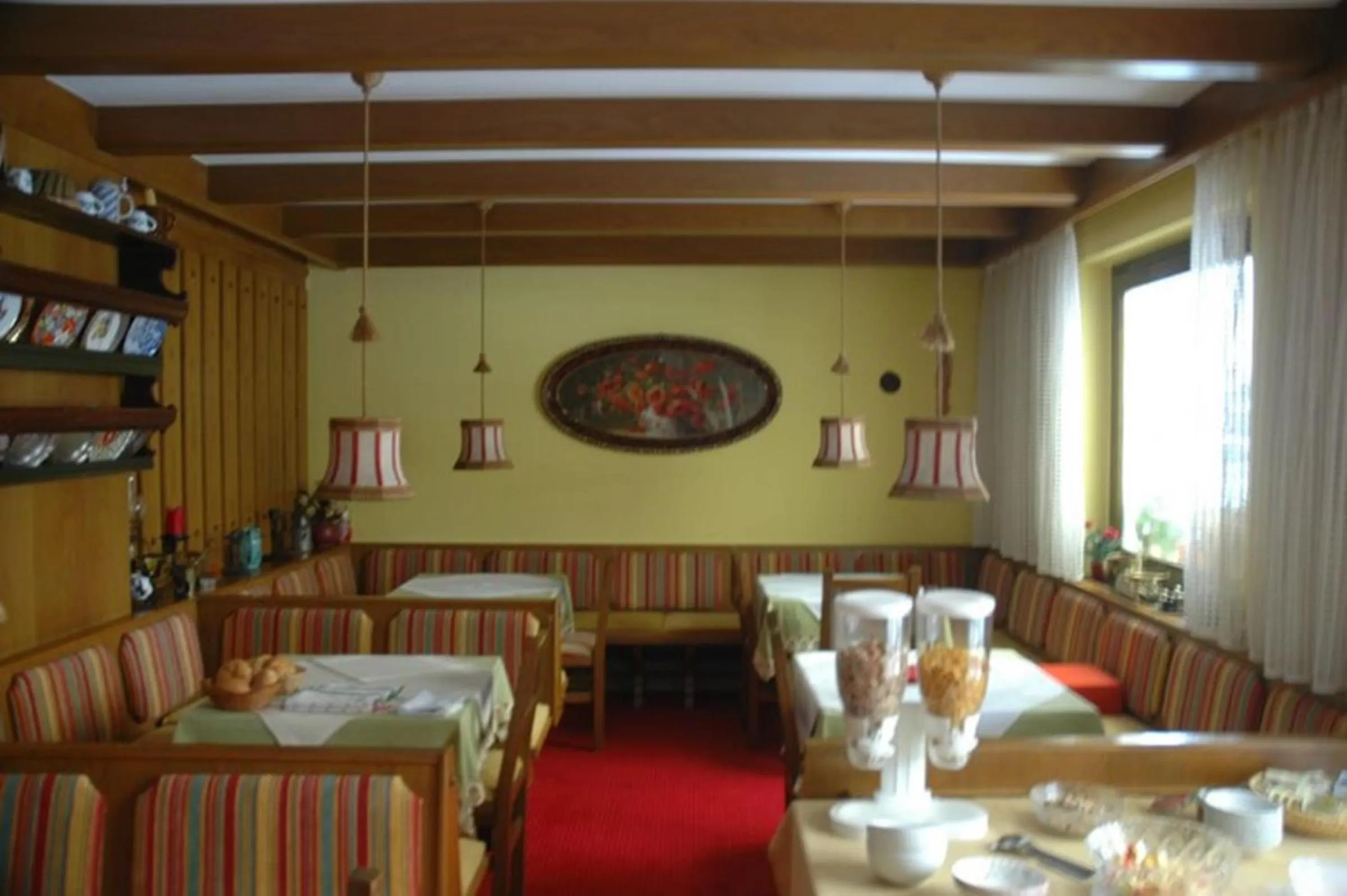 Communal lounge/ TV room in Gästehaus Pension Ria