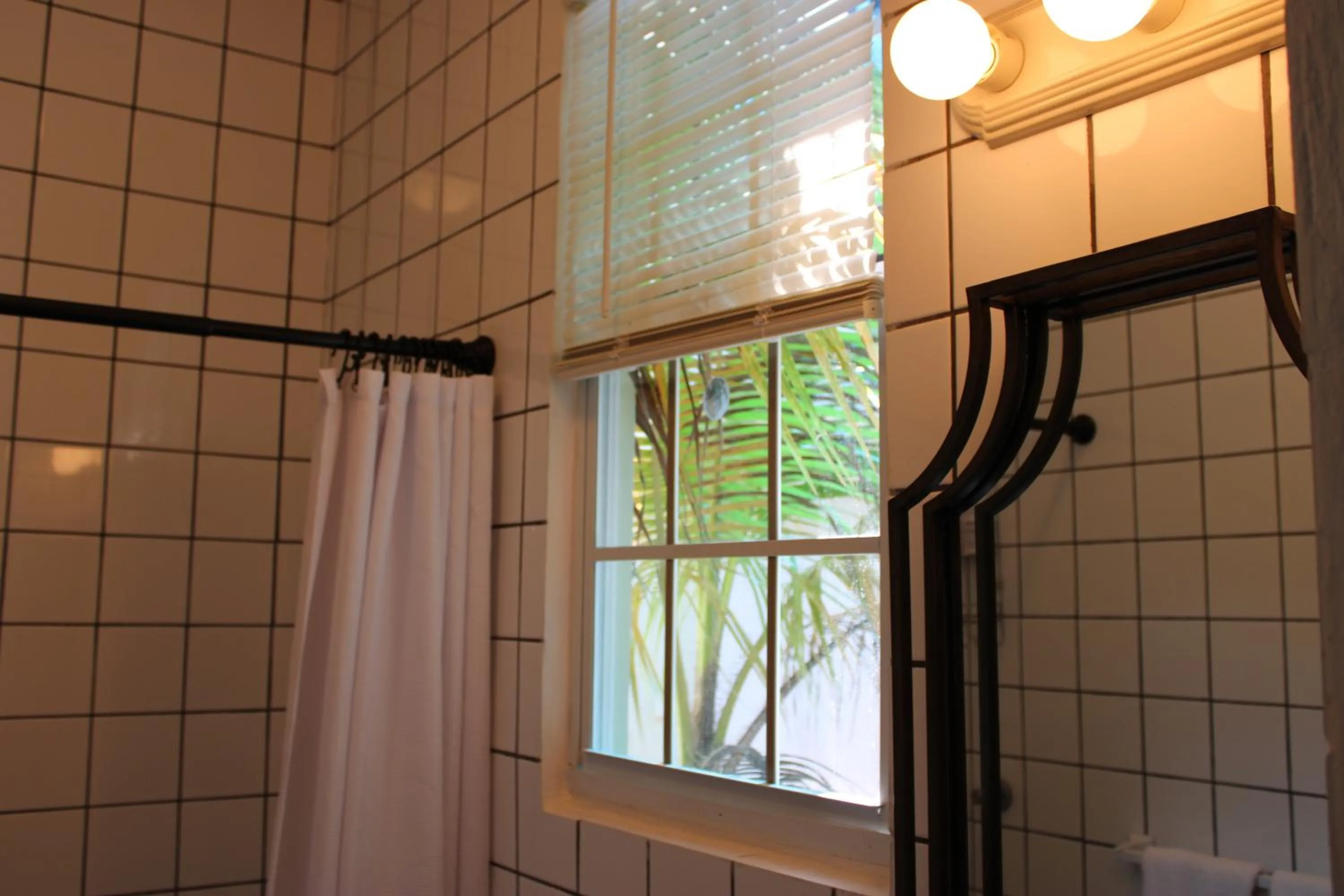 Bathroom in Numero Uno Beach Apartments