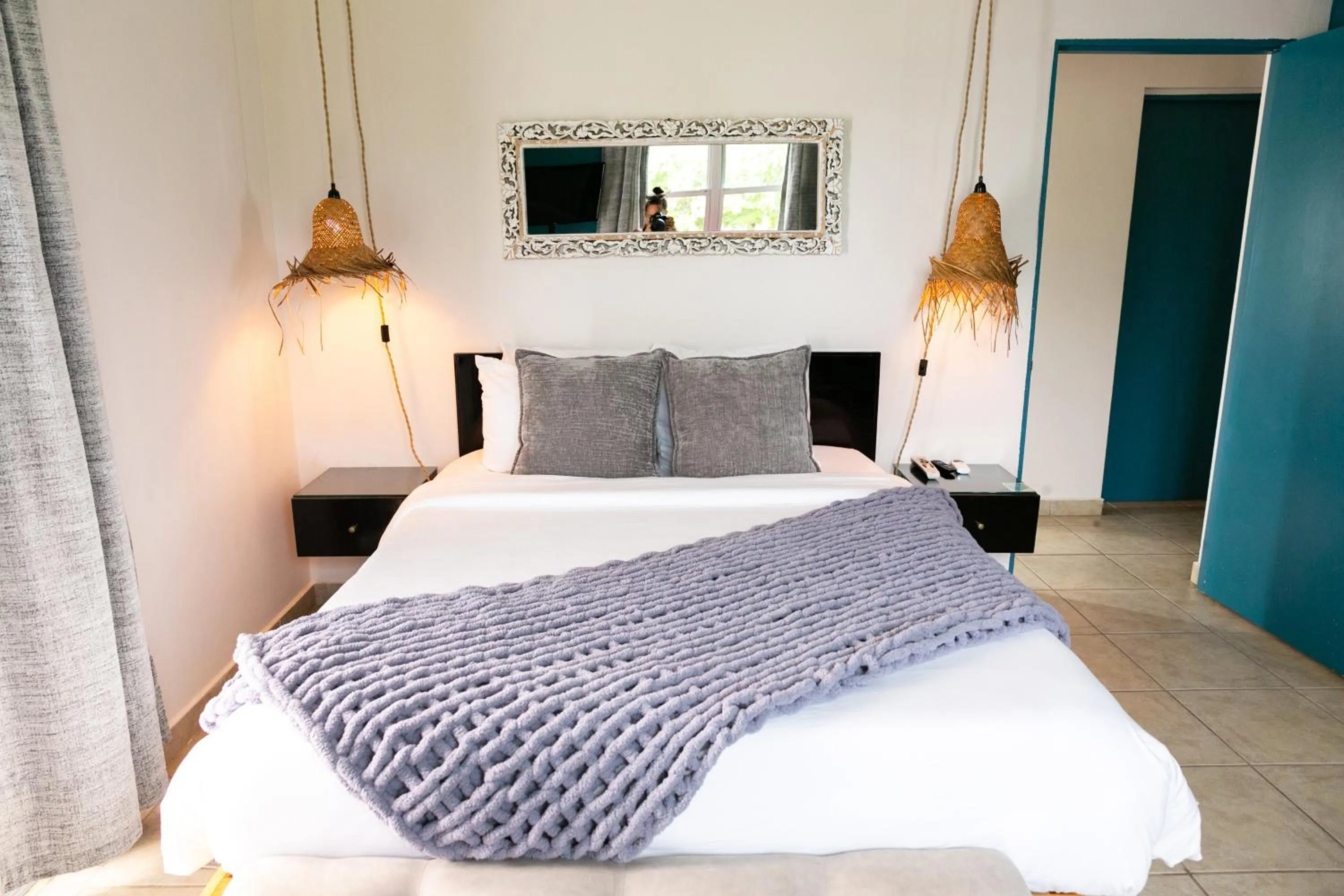 Bed in Numero Uno Beach Apartments