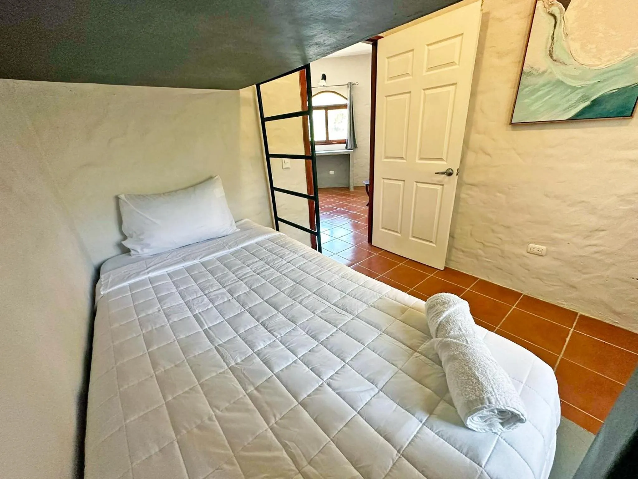 Bedroom in Surf Ranch Hotel & Resort