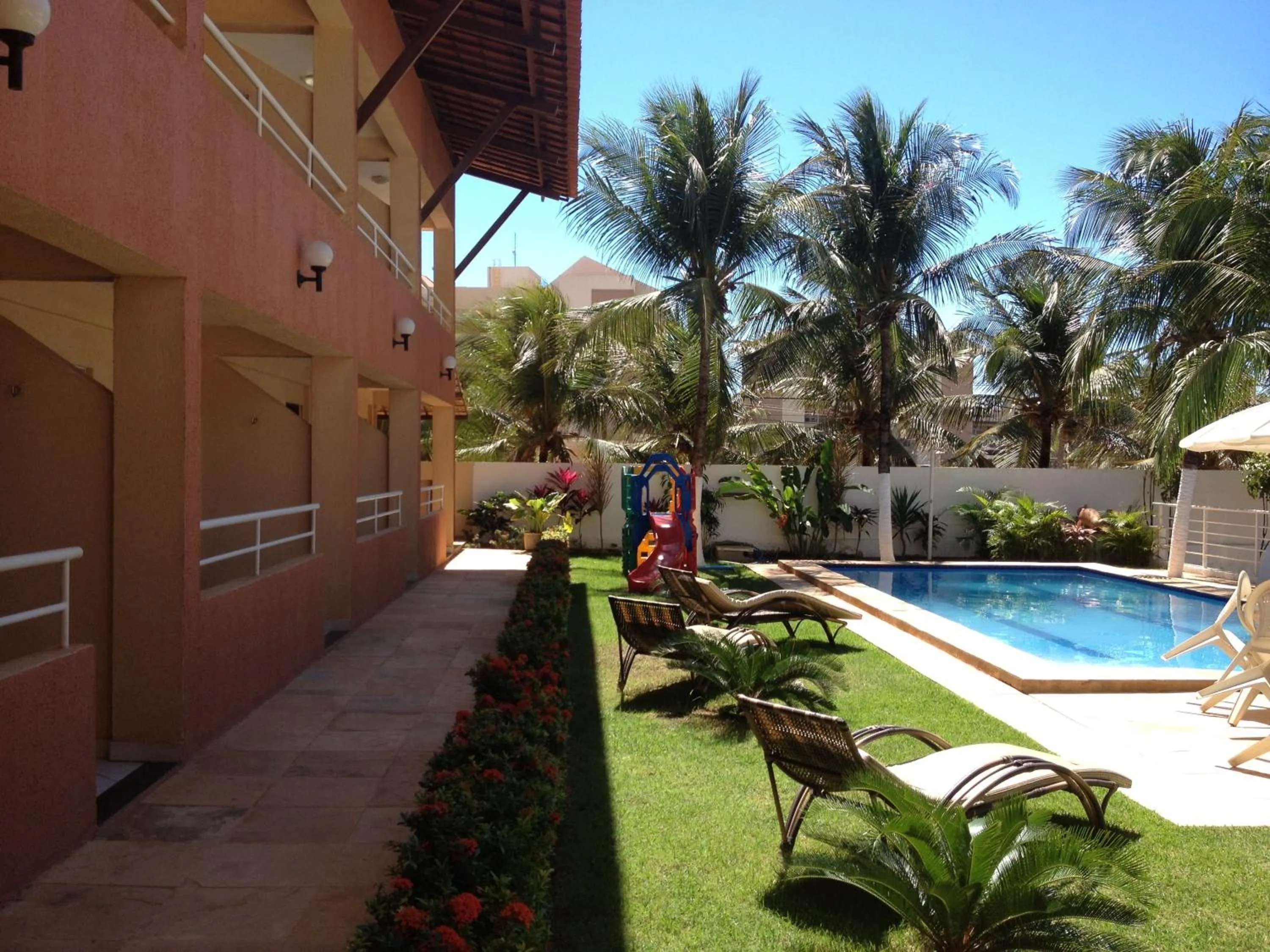 Swimming pool in Pousada Porto das Dunas