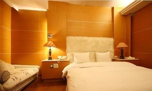 Bed in Zaw Jung Business Hotel