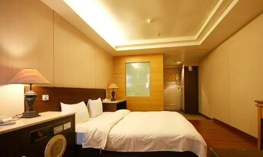 Bed in Zaw Jung Business Hotel
